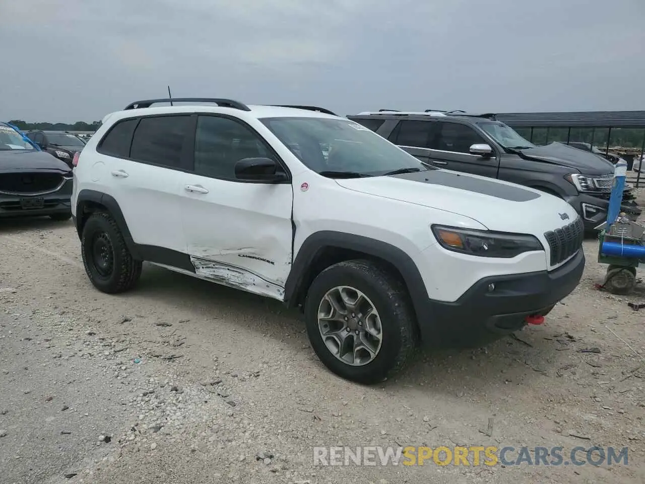 4 Photograph of a damaged car 1C4PJMBX2ND548837 JEEP CHEROKEE 2022