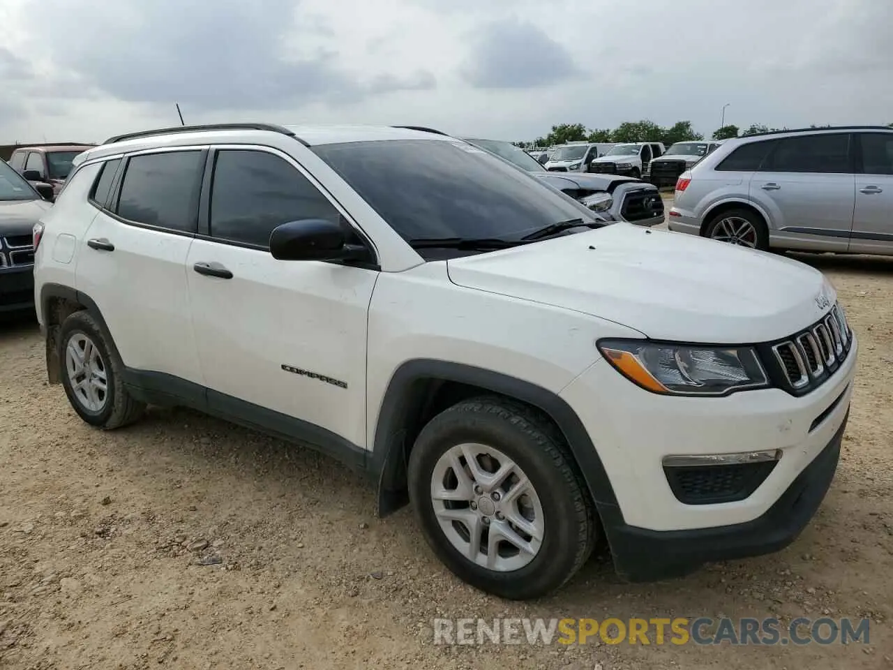 4 Photograph of a damaged car 3C4NJCAB1KT715444 JEEP COMPASS 2019