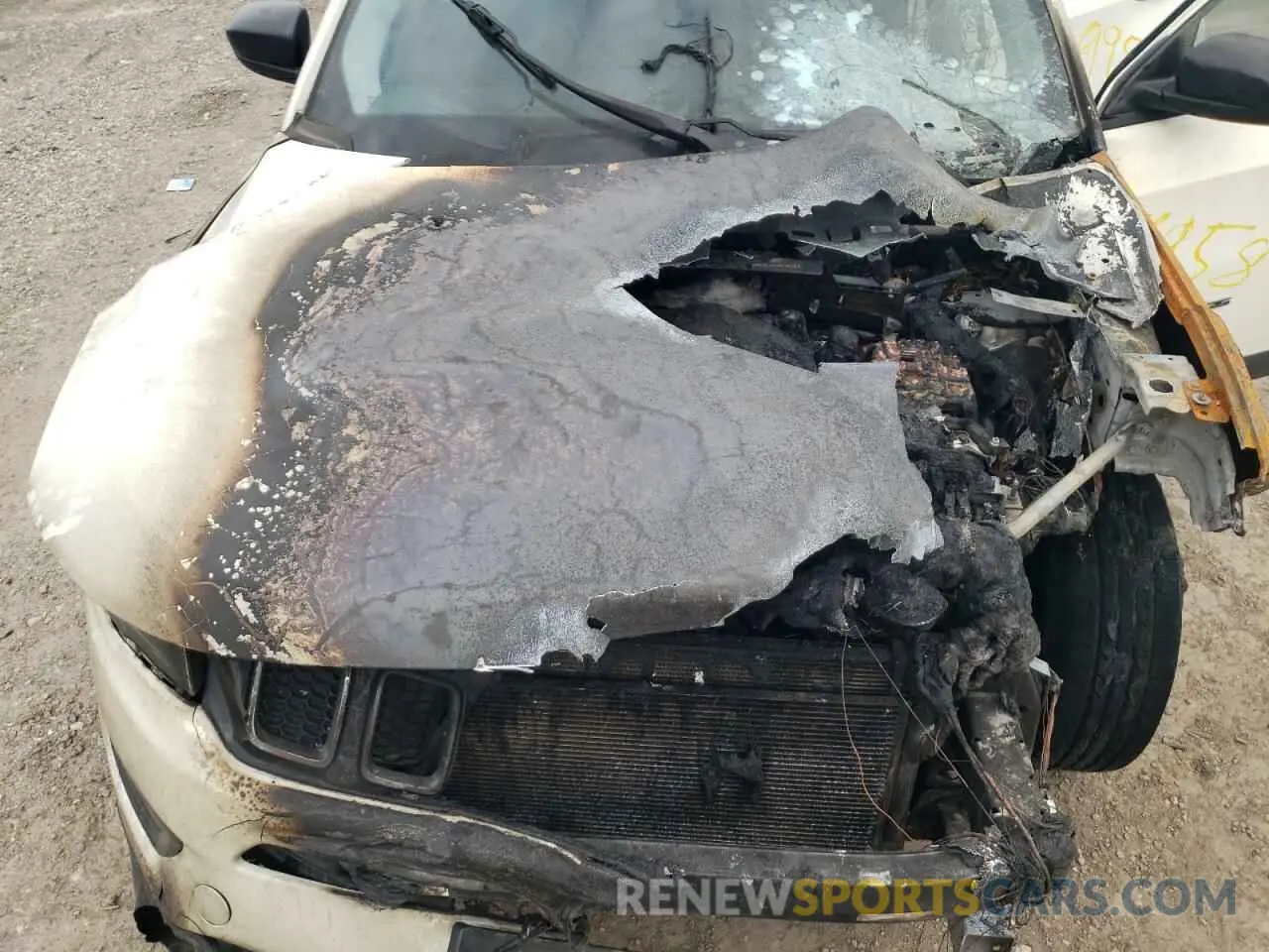 12 Photograph of a damaged car 3C4NJCAB5KT699958 JEEP COMPASS 2019