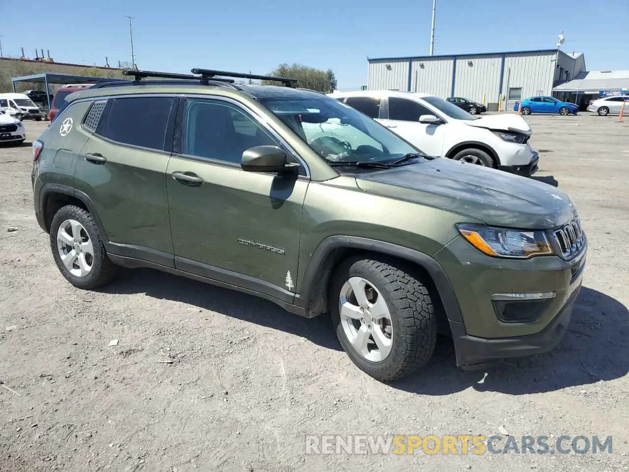 4 Photograph of a damaged car 3C4NJCBB1KT743968 JEEP COMPASS 2019