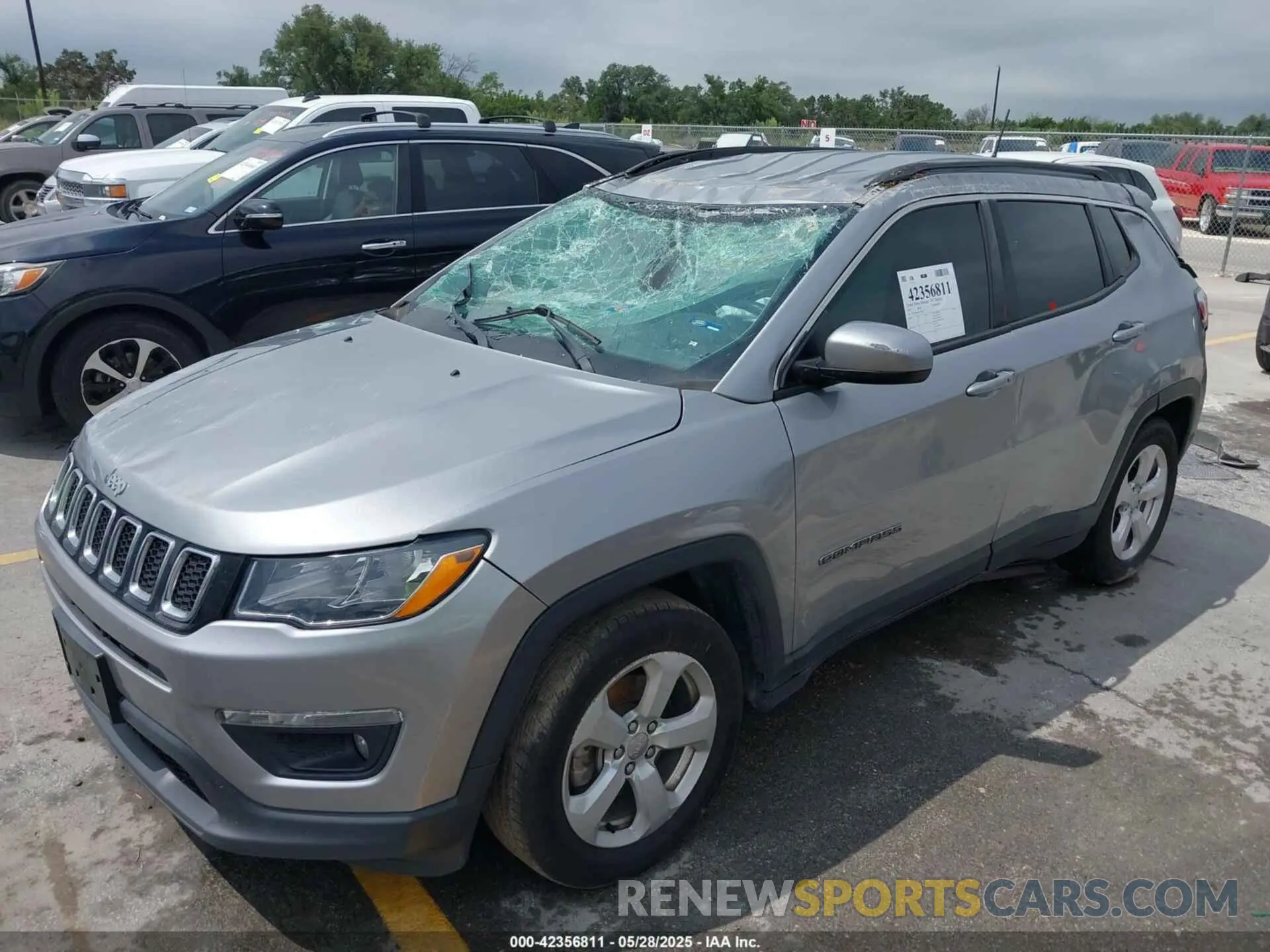 11 Photograph of a damaged car 3C4NJCBB1KT782429 JEEP COMPASS 2019
