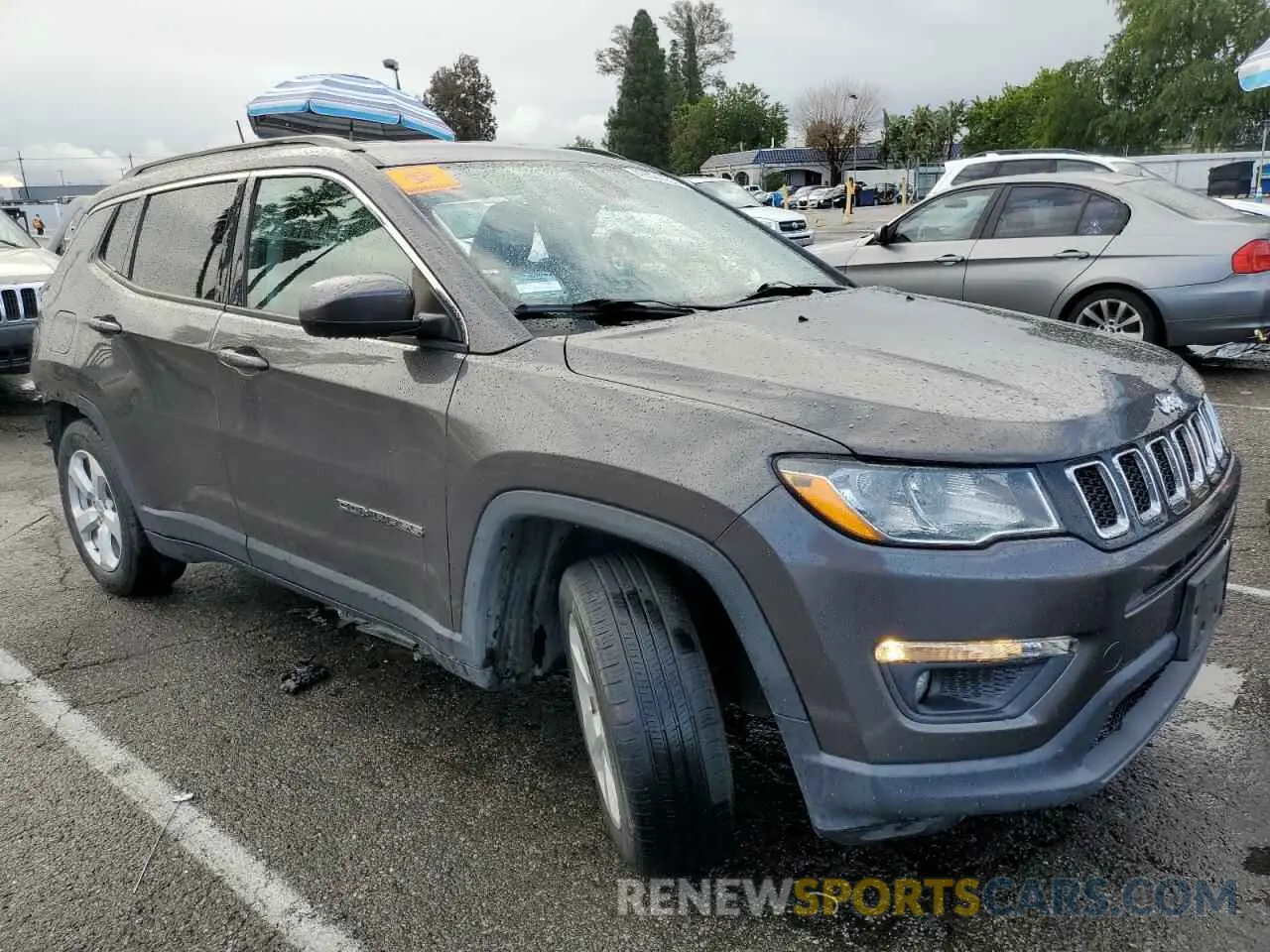 4 Photograph of a damaged car 3C4NJCBB3KT788913 JEEP COMPASS 2019