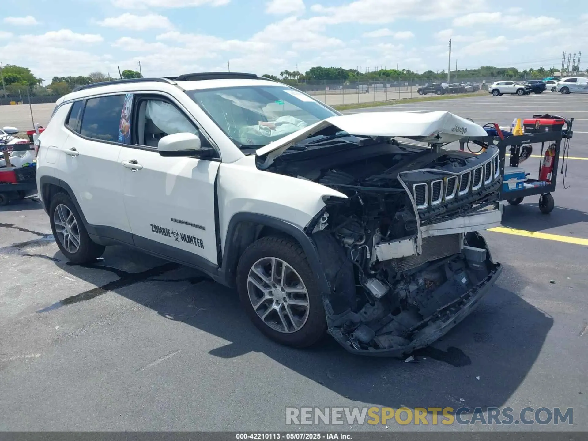 1 Photograph of a damaged car 3C4NJCBB3KT832196 JEEP COMPASS 2019