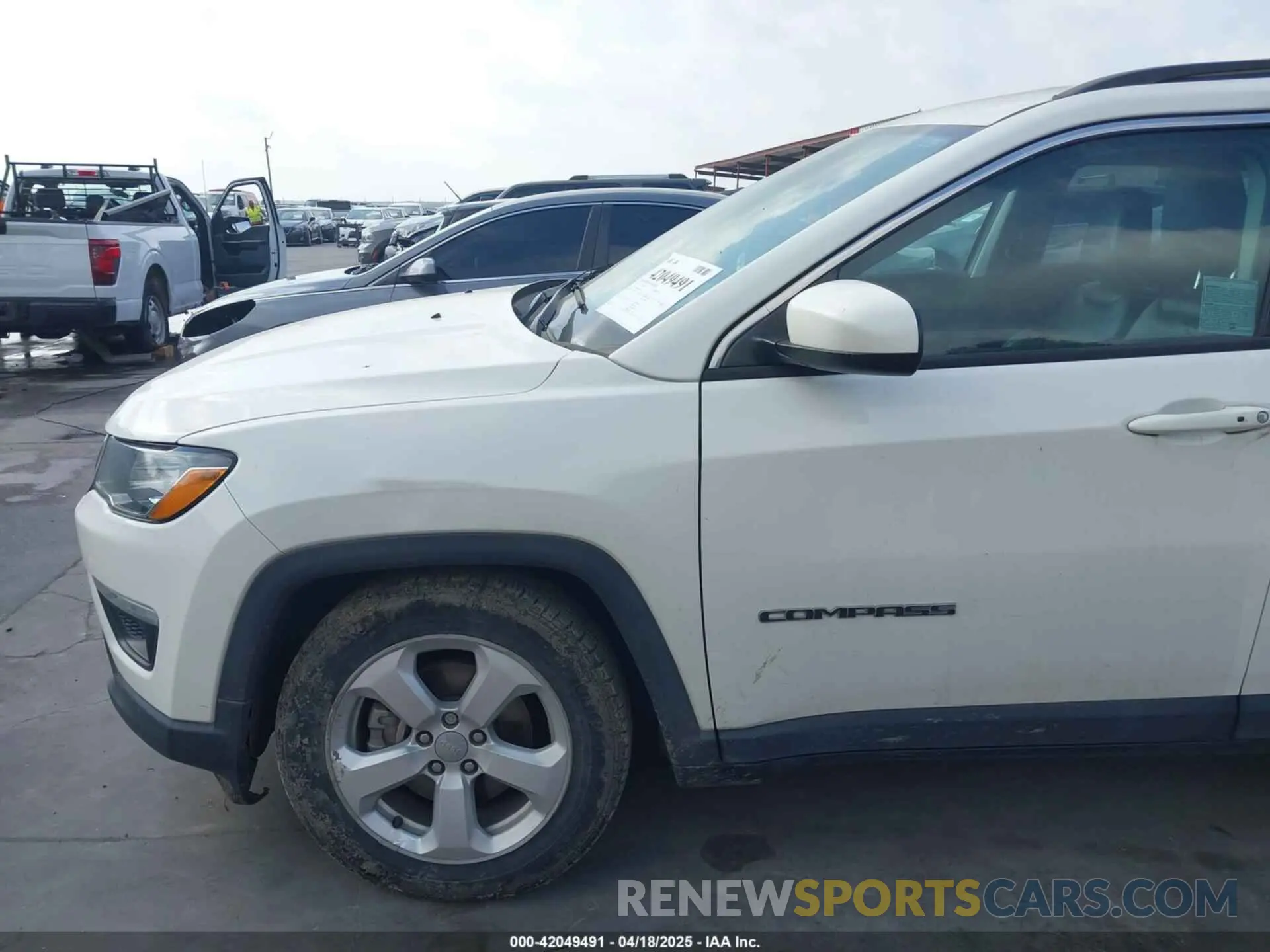 12 Photograph of a damaged car 3C4NJCBB4KT616437 JEEP COMPASS 2019