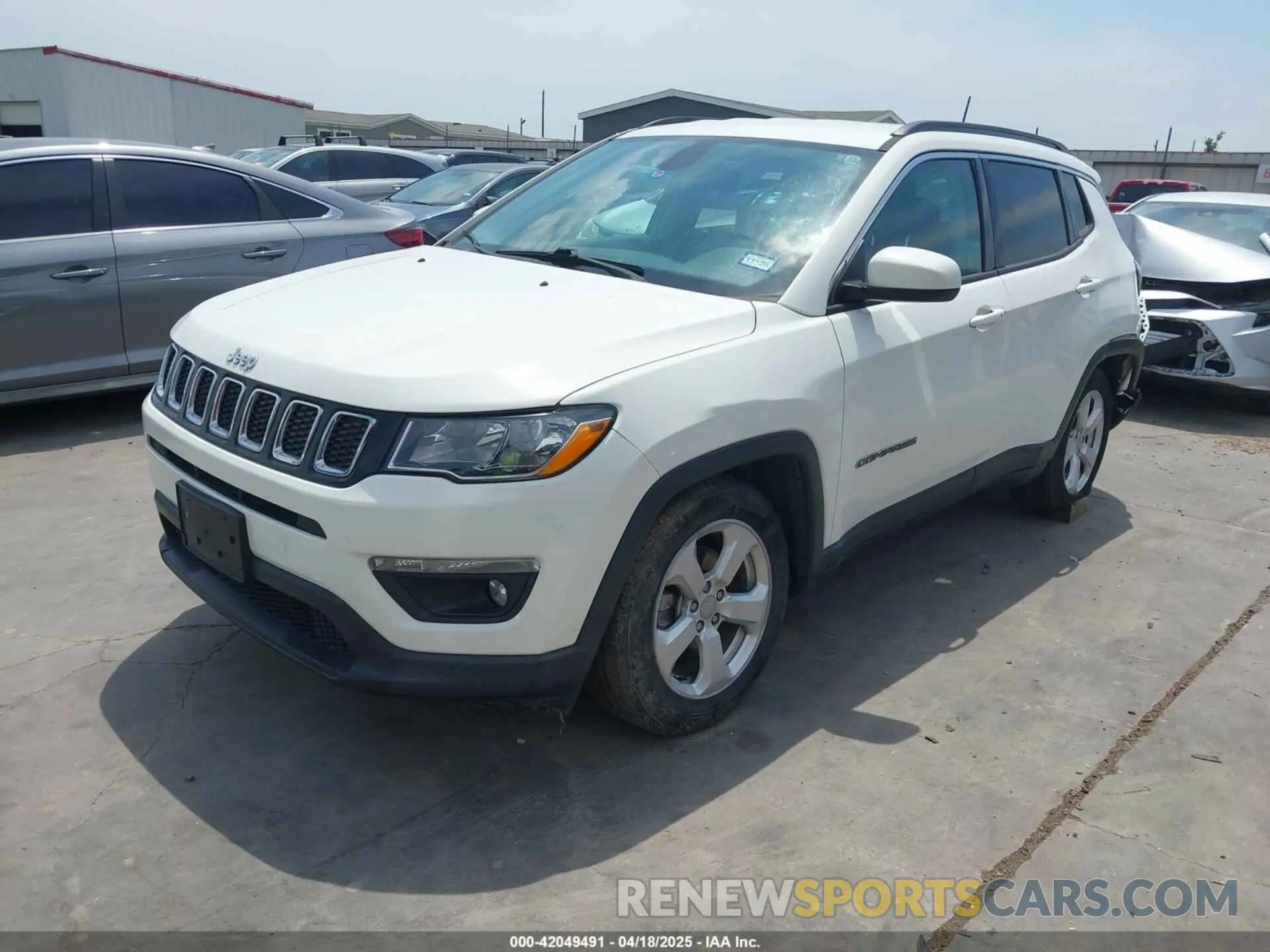 2 Photograph of a damaged car 3C4NJCBB4KT616437 JEEP COMPASS 2019