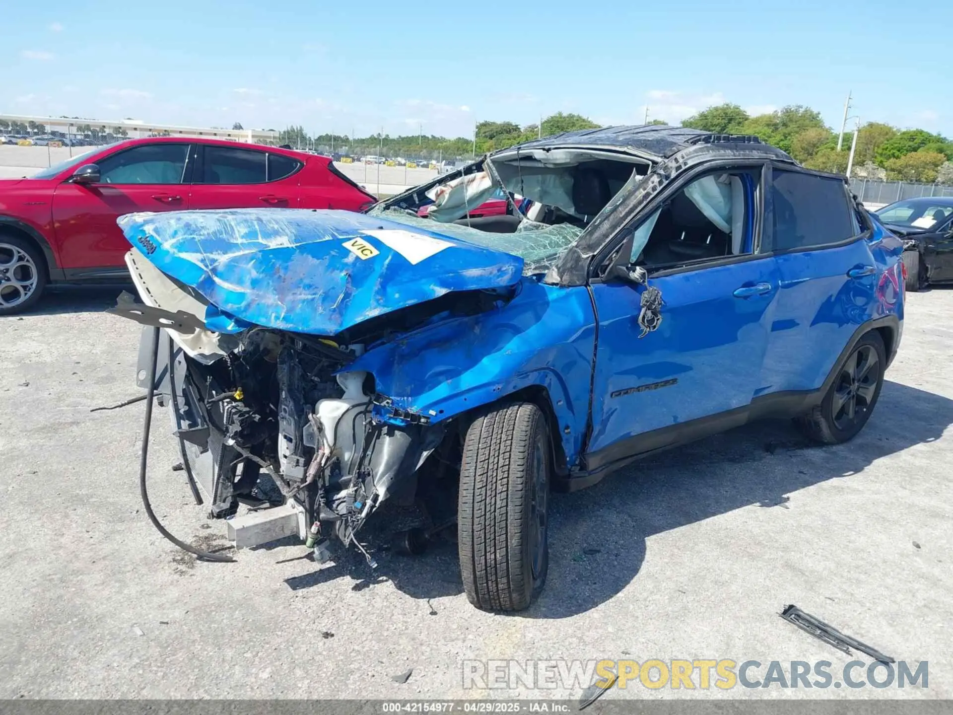 2 Photograph of a damaged car 3C4NJCBB4KT667615 JEEP COMPASS 2019