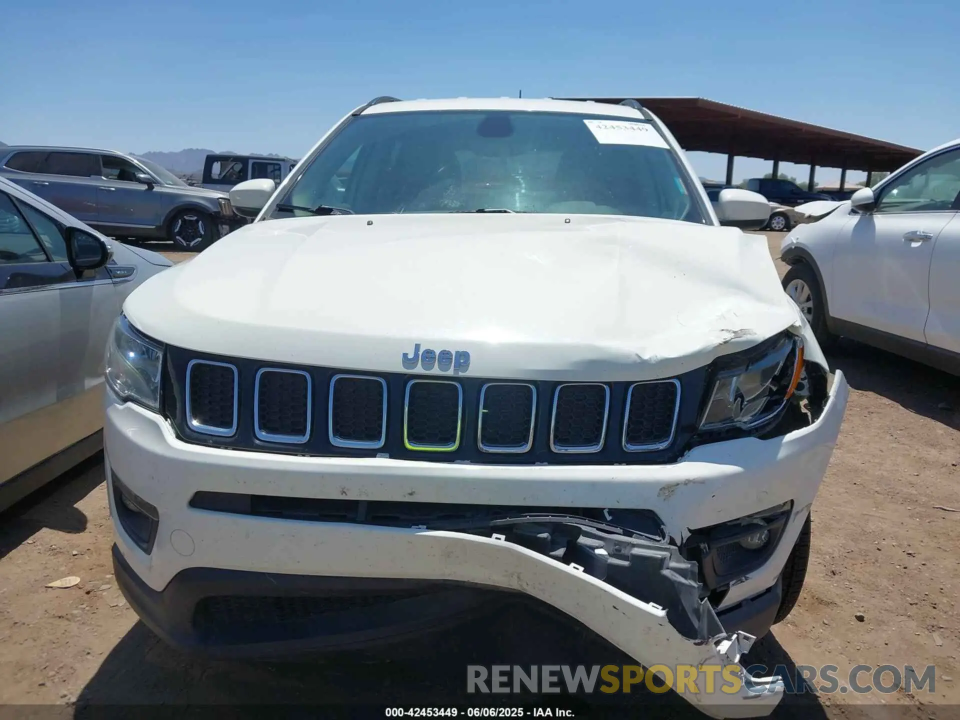 12 Photograph of a damaged car 3C4NJCBB4KT692711 JEEP COMPASS 2019
