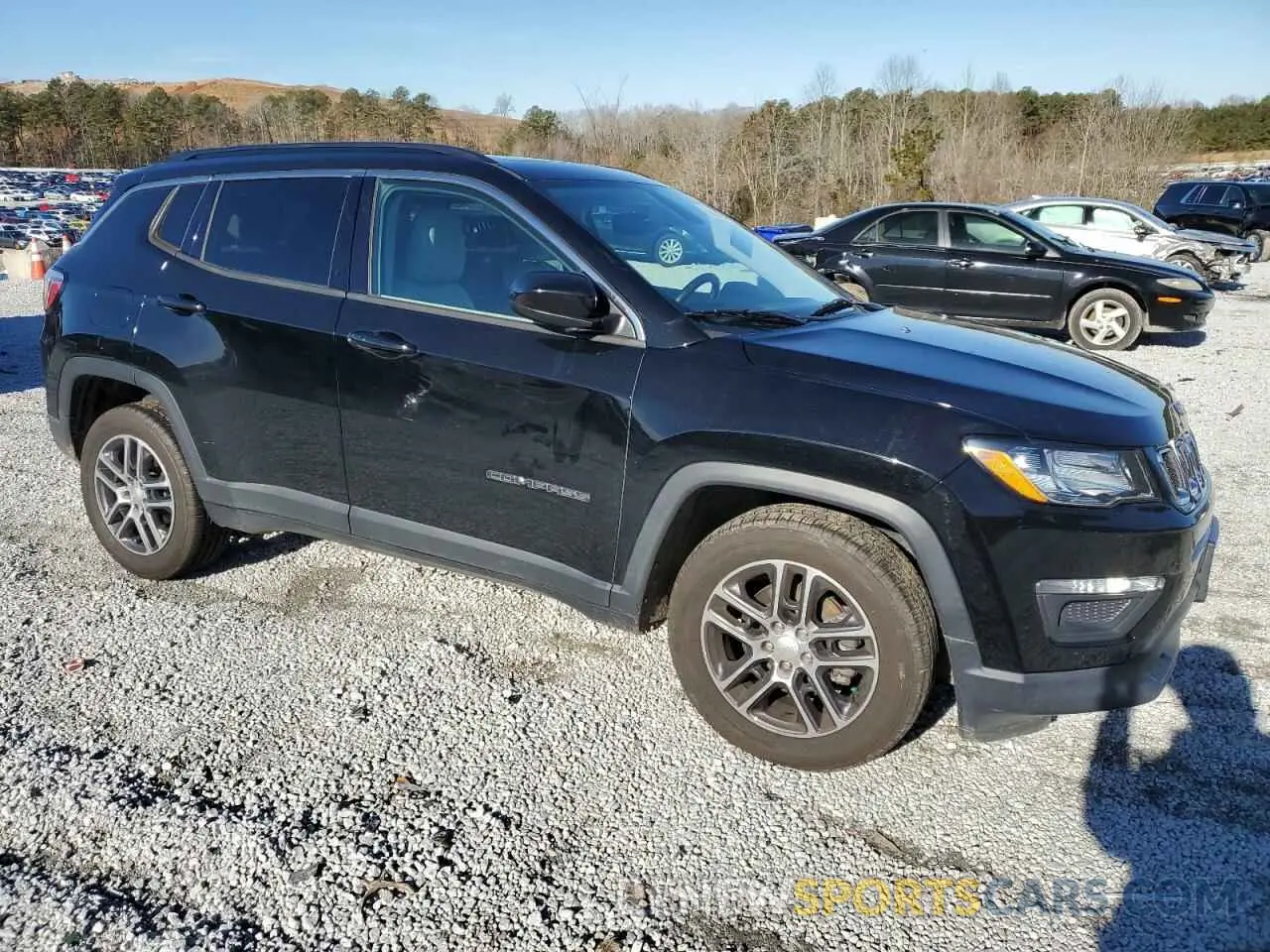4 Photograph of a damaged car 3C4NJCBB4KT726100 JEEP COMPASS 2019