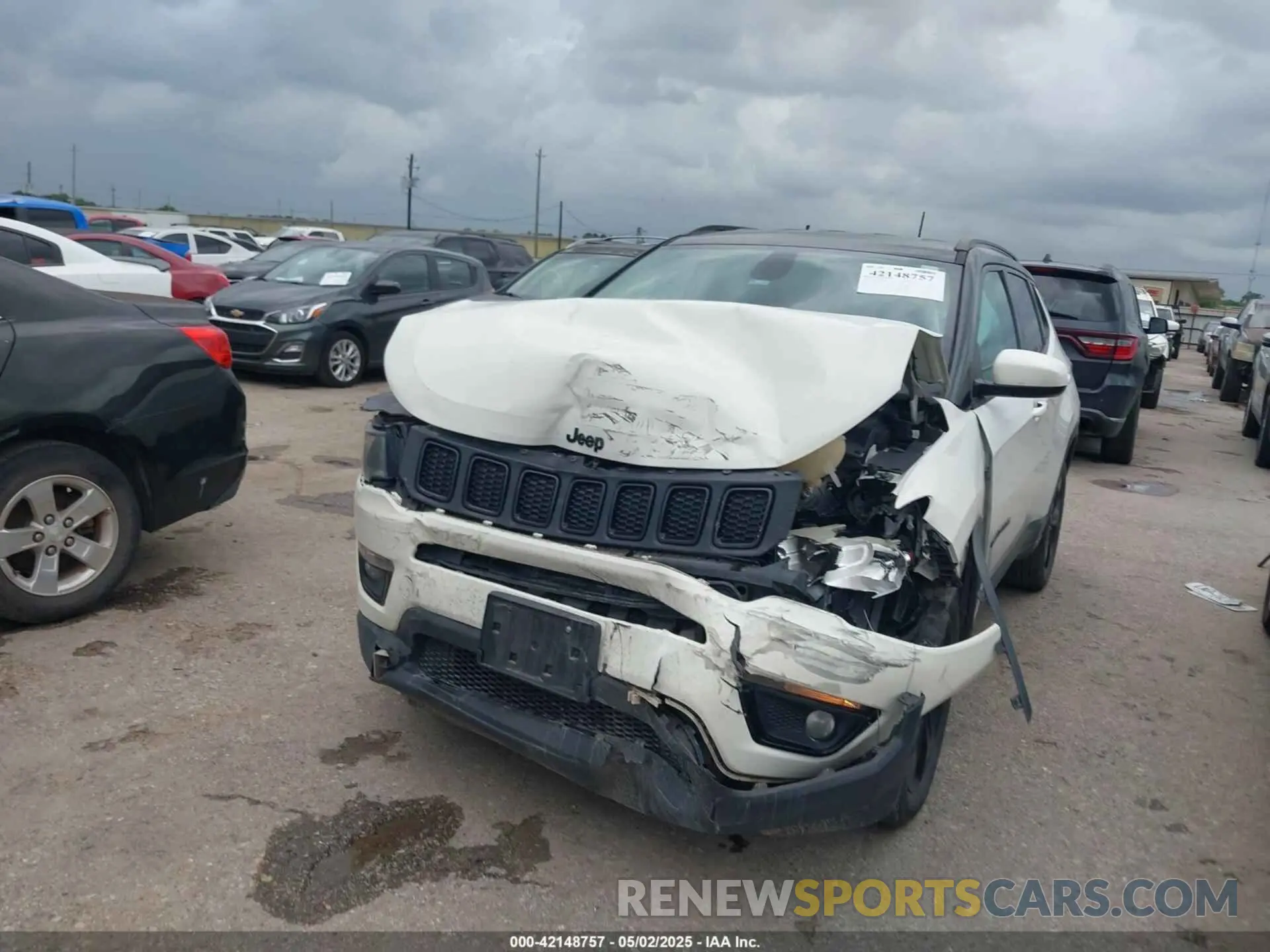 2 Photograph of a damaged car 3C4NJCBB5KT615720 JEEP COMPASS 2019