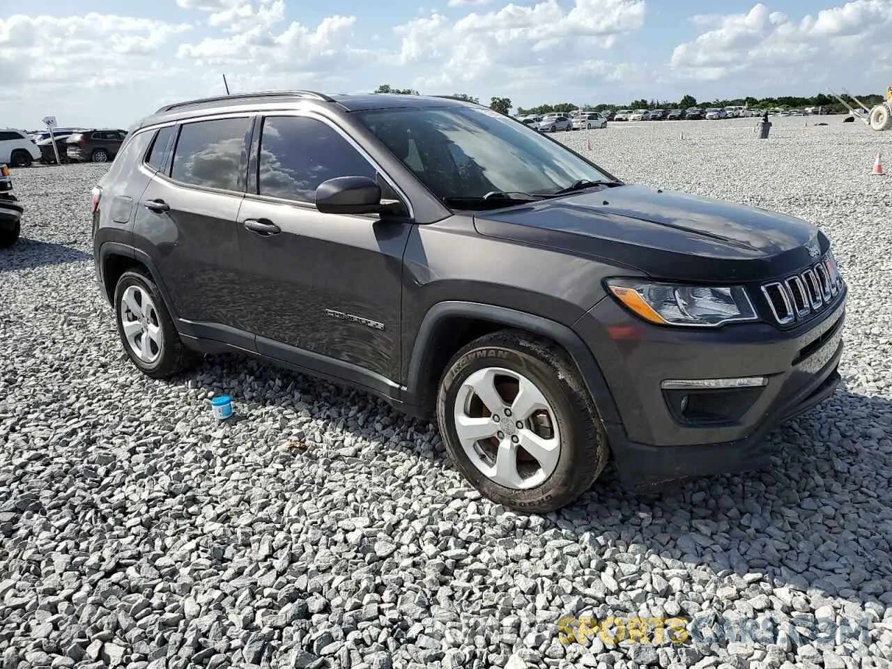 4 Photograph of a damaged car 3C4NJCBB5KT851249 JEEP COMPASS 2019