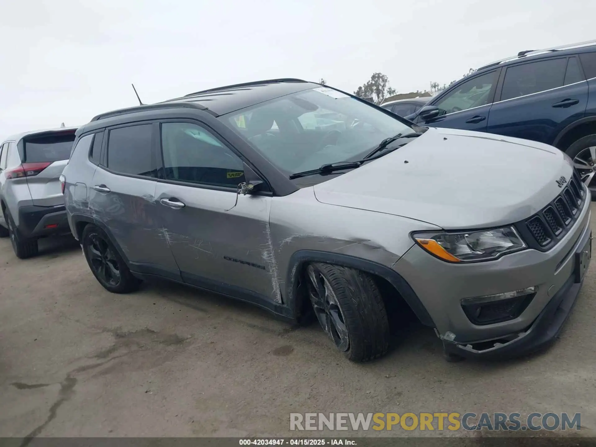 14 Photograph of a damaged car 3C4NJCBB7KT617761 JEEP COMPASS 2019