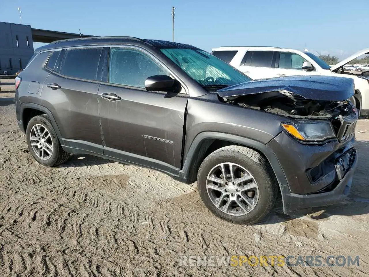 4 Photograph of a damaged car 3C4NJCBB7KT663851 JEEP COMPASS 2019