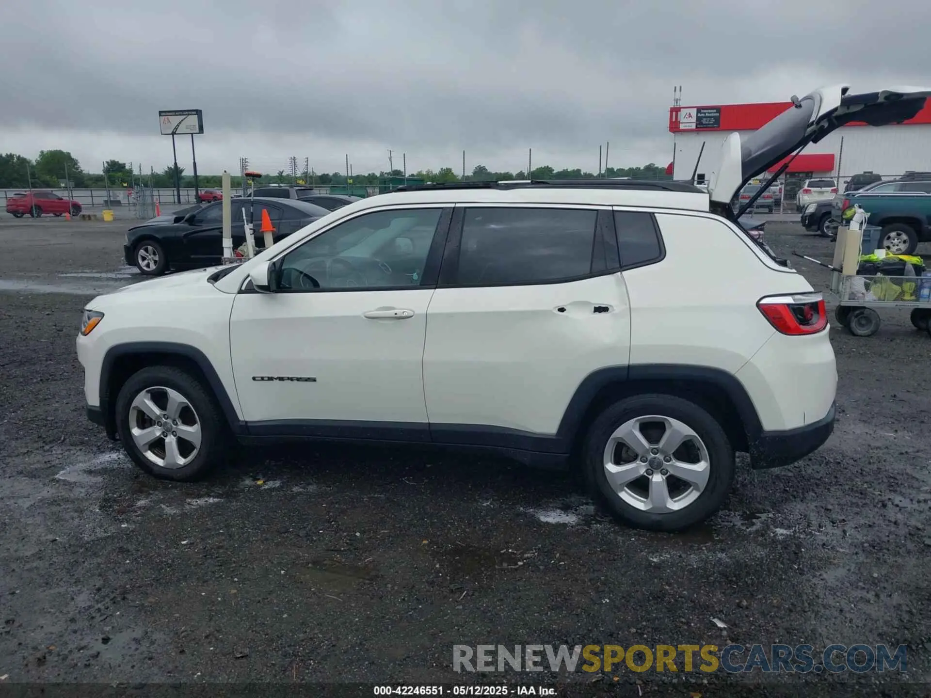 14 Photograph of a damaged car 3C4NJCBB9KT652222 JEEP COMPASS 2019