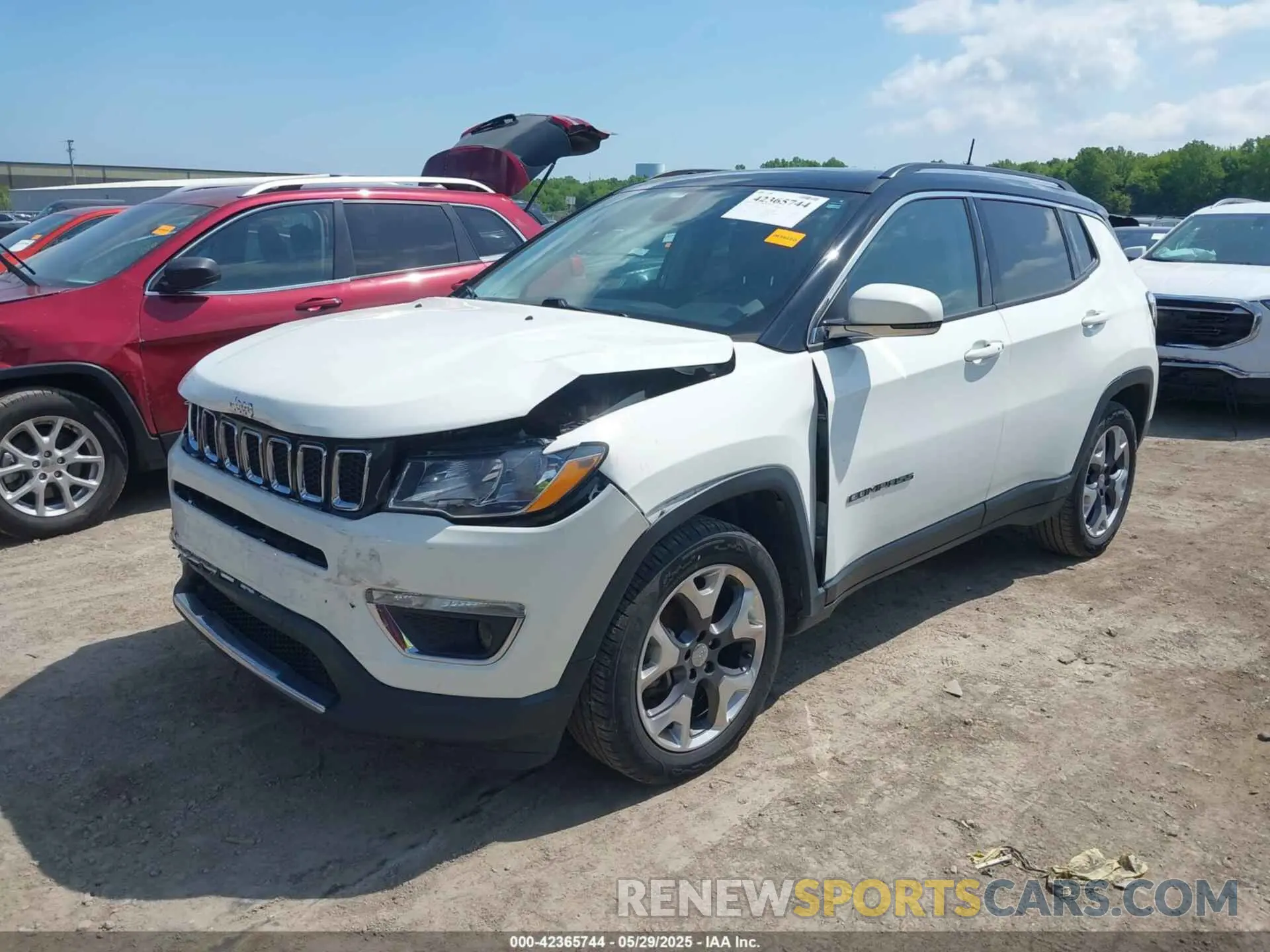 2 Photograph of a damaged car 3C4NJCCB4KT743865 JEEP COMPASS 2019