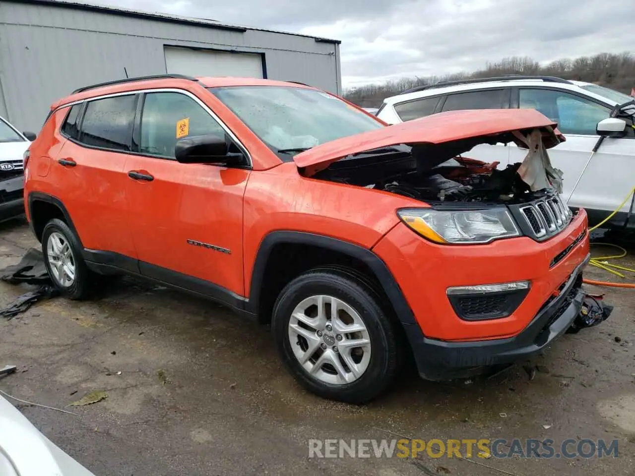 4 Photograph of a damaged car 3C4NJDAB5KT630628 JEEP COMPASS 2019
