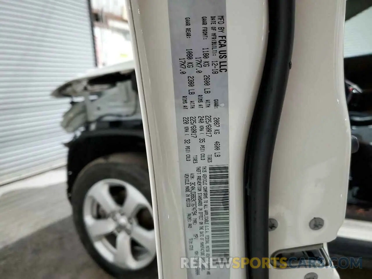 14 Photograph of a damaged car 3C4NJDBB2KT674794 JEEP COMPASS 2019