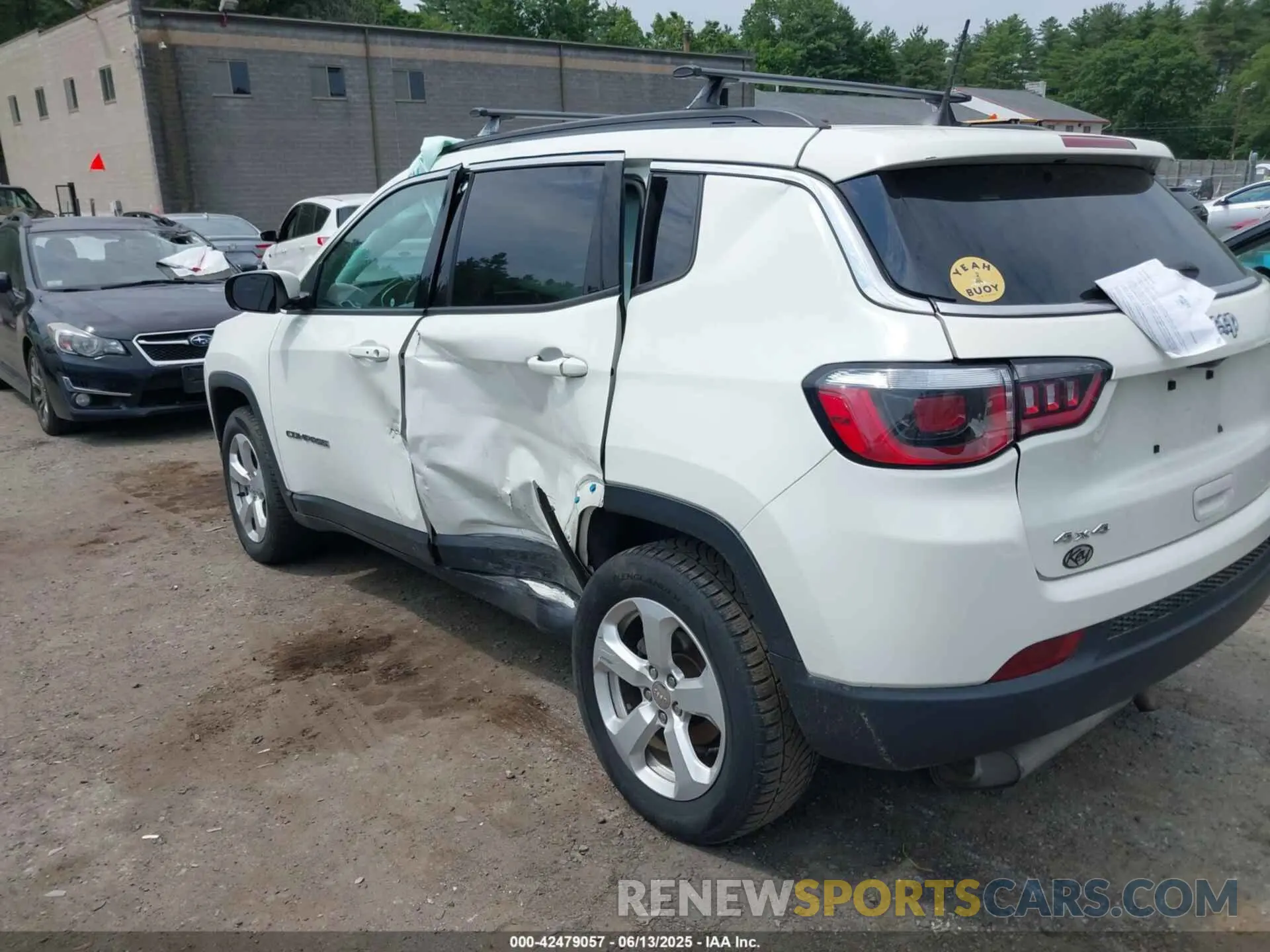 14 Photograph of a damaged car 3C4NJDBB6KT601993 JEEP COMPASS 2019