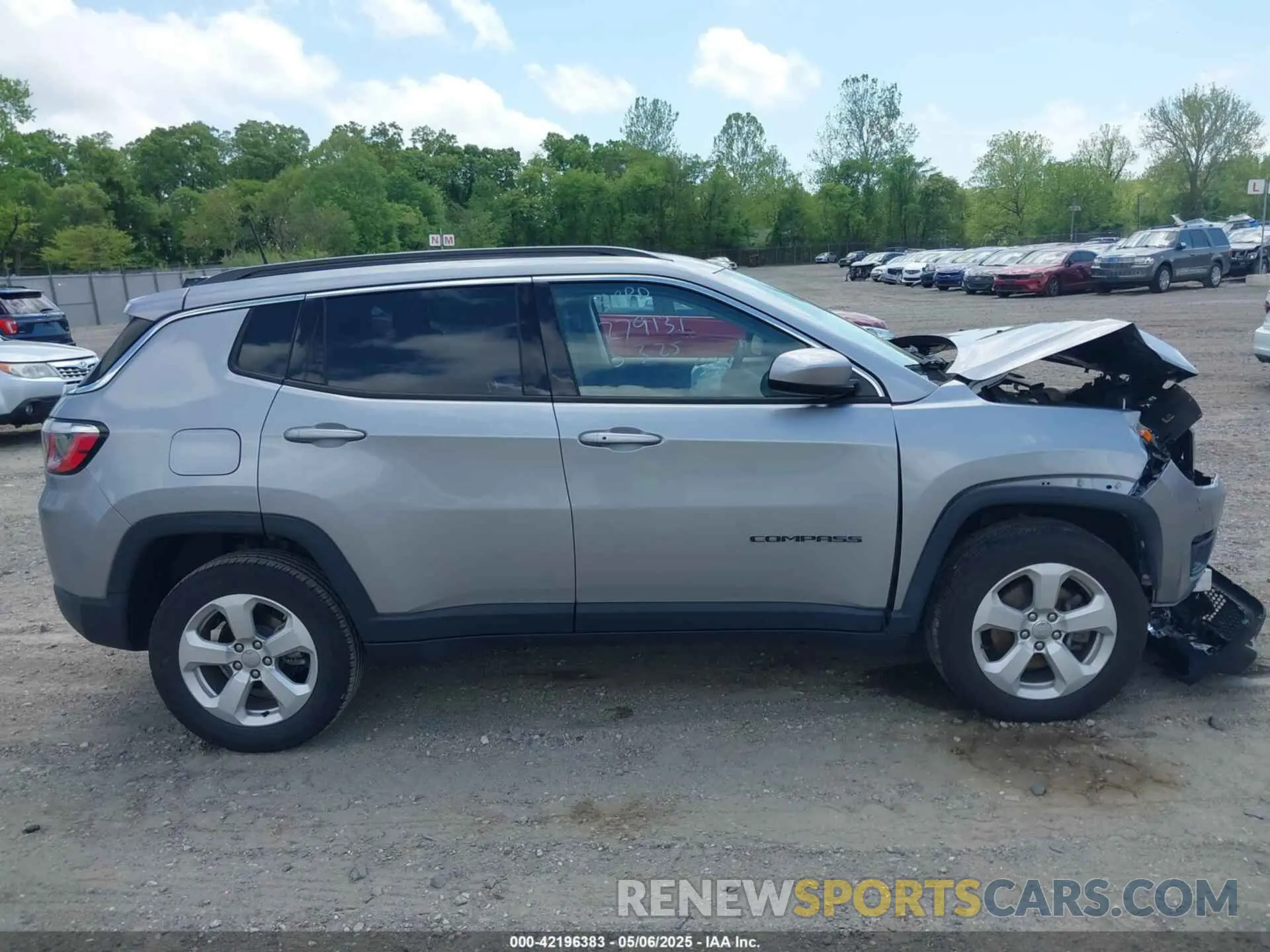 14 Photograph of a damaged car 3C4NJDBB6KT657190 JEEP COMPASS 2019