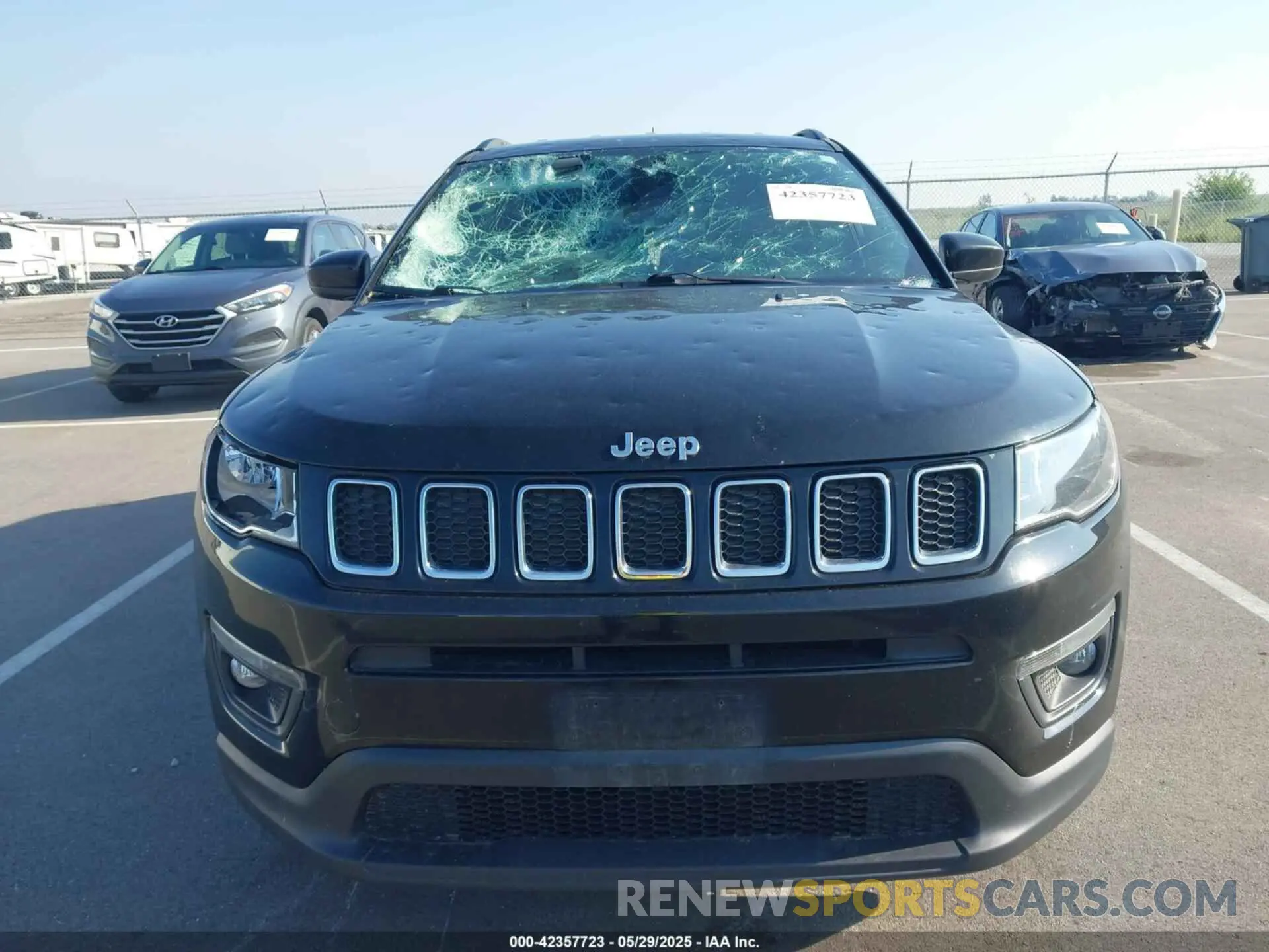 12 Photograph of a damaged car 3C4NJDBB7KT761185 JEEP COMPASS 2019