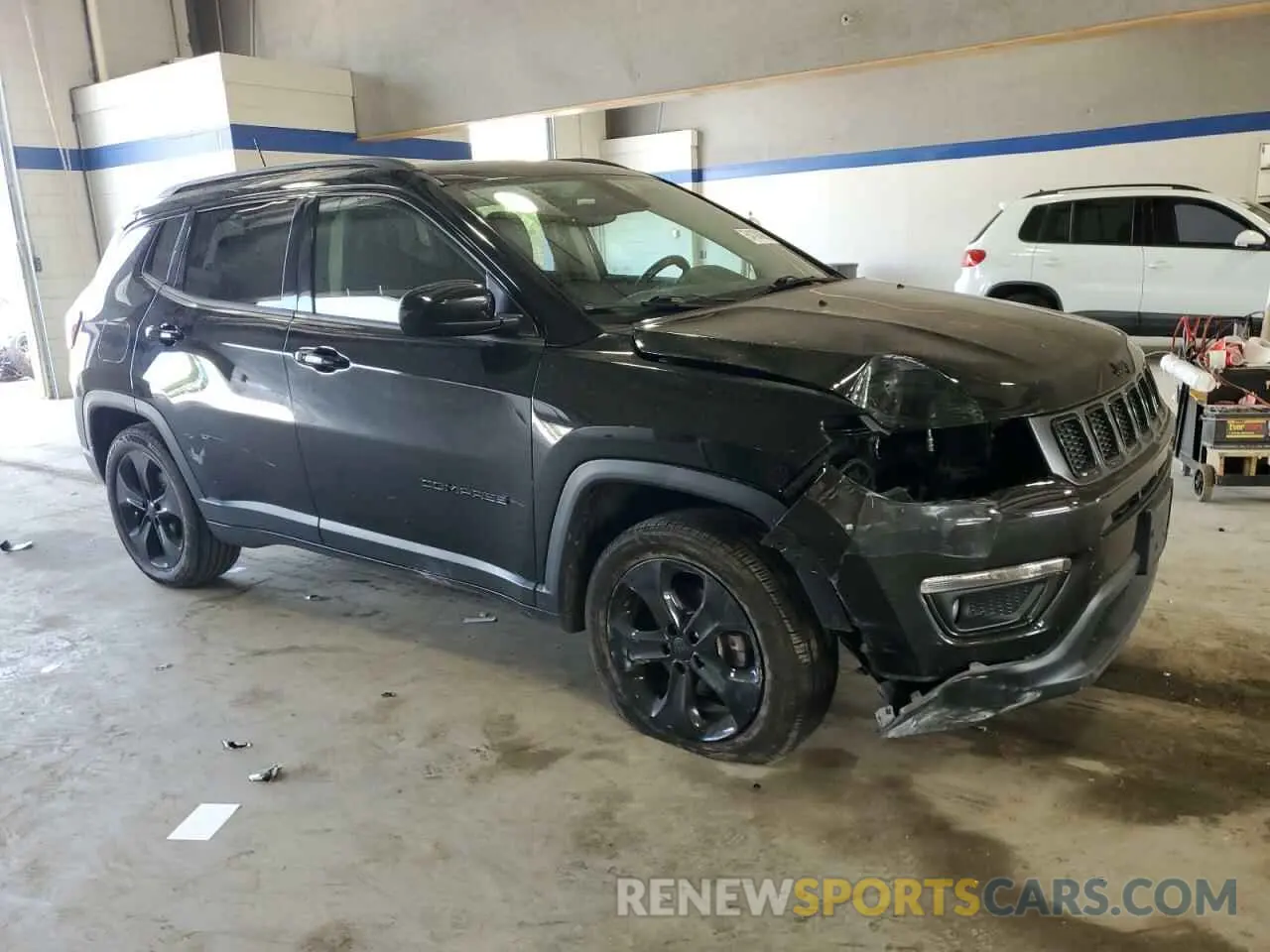 4 Photograph of a damaged car 3C4NJDBB8KT647373 JEEP COMPASS 2019