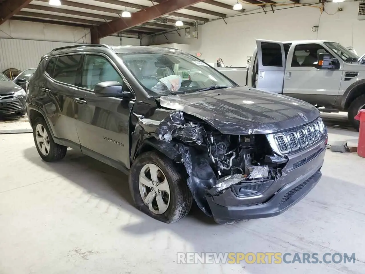 4 Photograph of a damaged car 3C4NJDBB9KT813447 JEEP COMPASS 2019