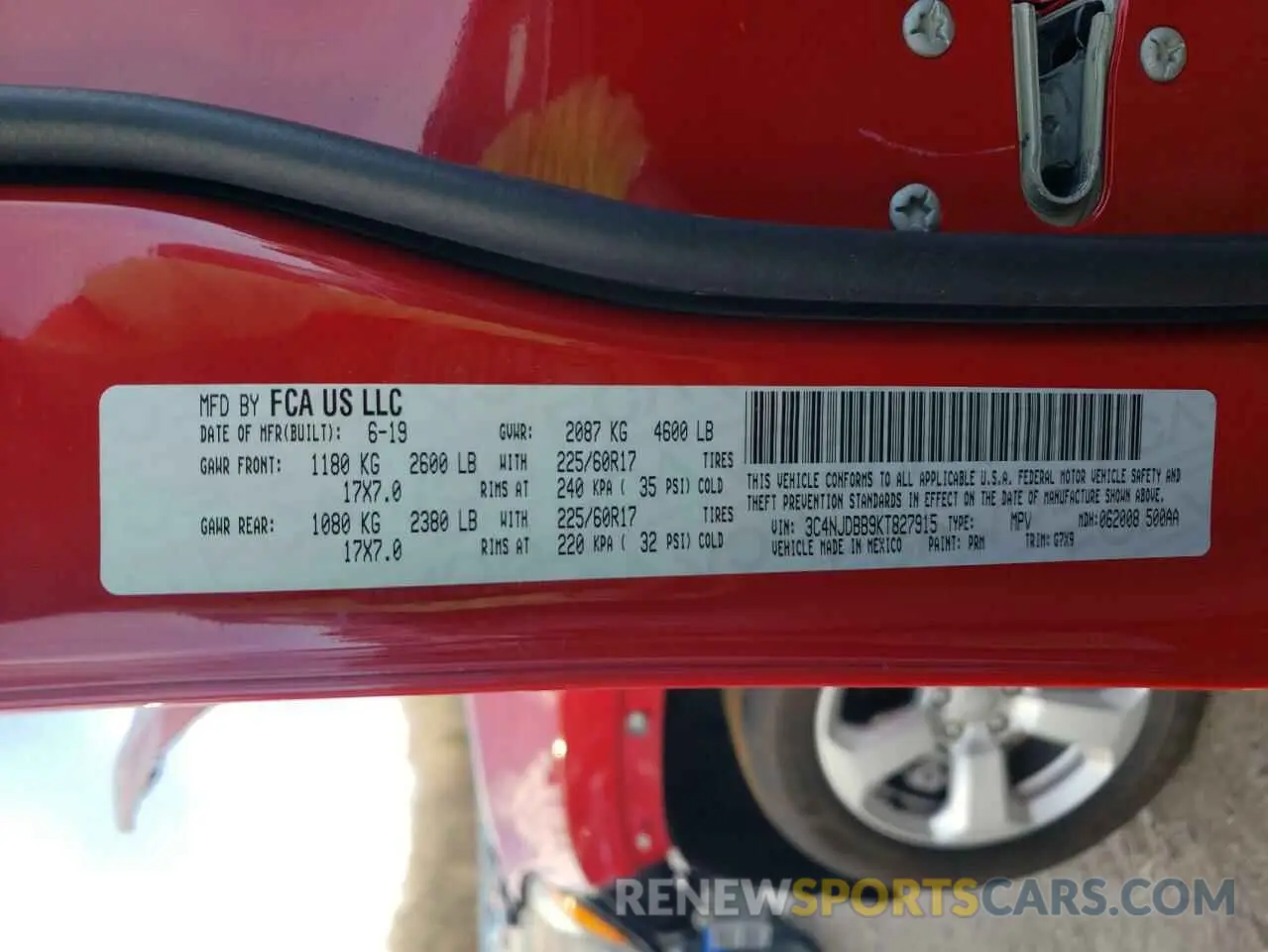 14 Photograph of a damaged car 3C4NJDBB9KT827915 JEEP COMPASS 2019