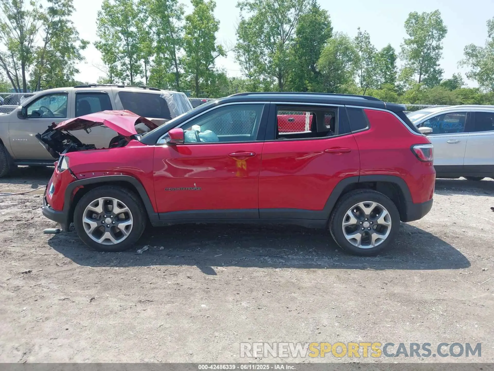 14 Photograph of a damaged car 3C4NJDCB0KT656504 JEEP COMPASS 2019