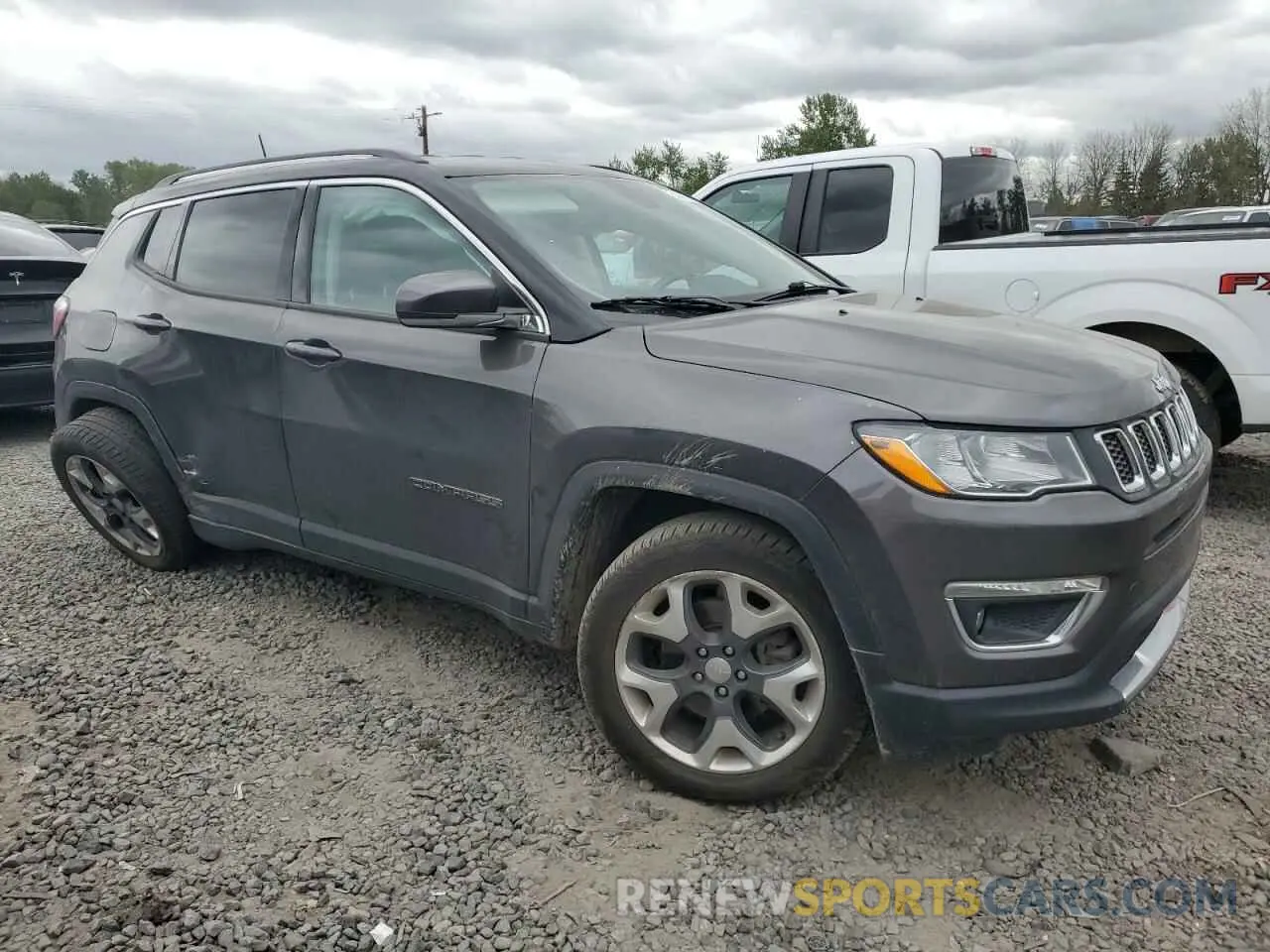 4 Photograph of a damaged car 3C4NJDCB1KT791619 JEEP COMPASS 2019