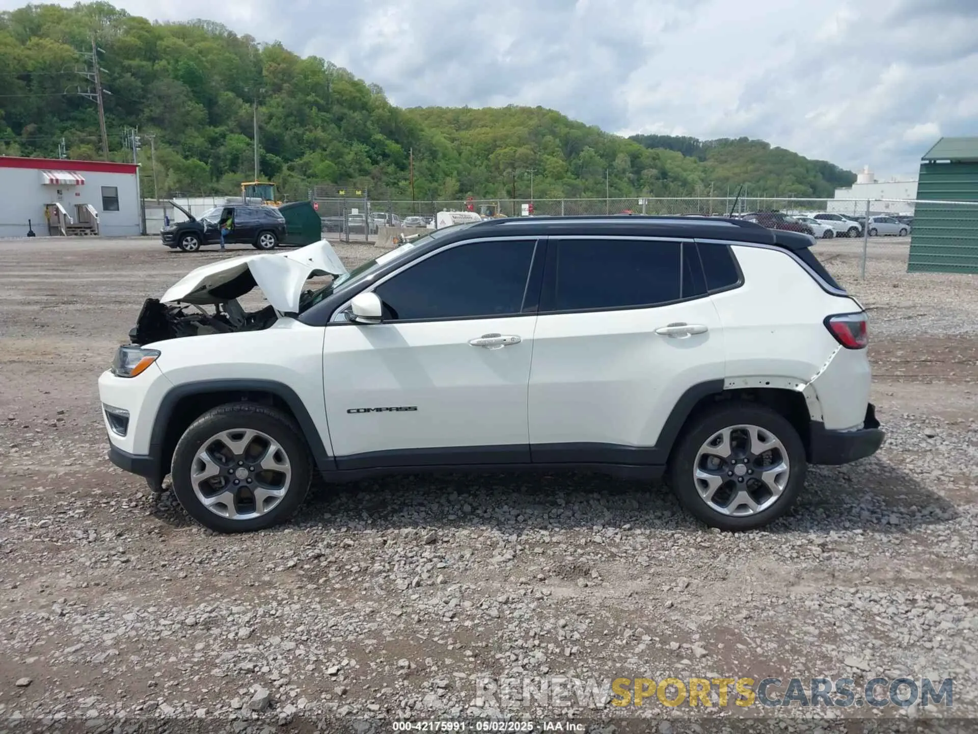 14 Photograph of a damaged car 3C4NJDCB2KT704231 JEEP COMPASS 2019