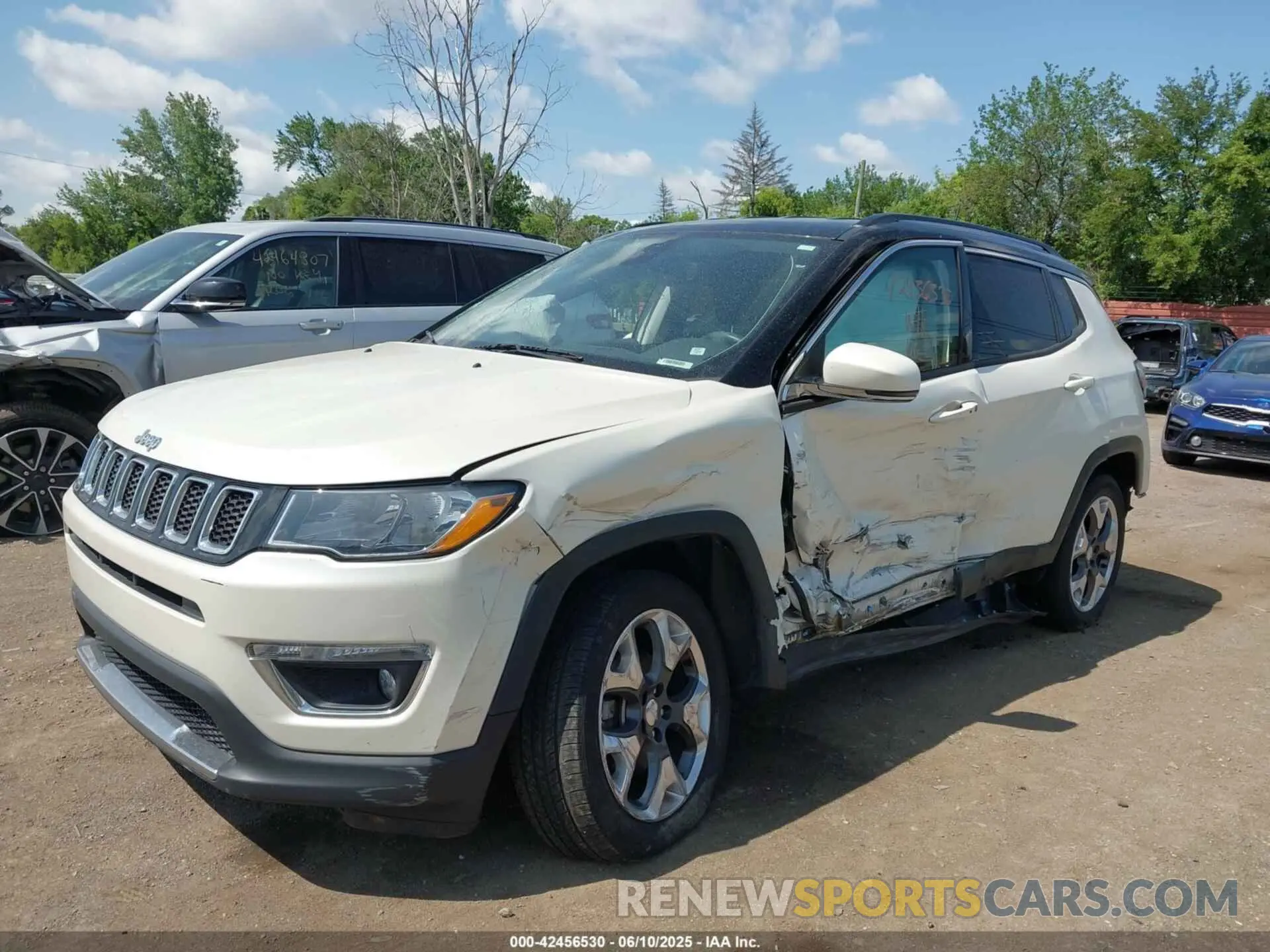2 Photograph of a damaged car 3C4NJDCB4KT818425 JEEP COMPASS 2019