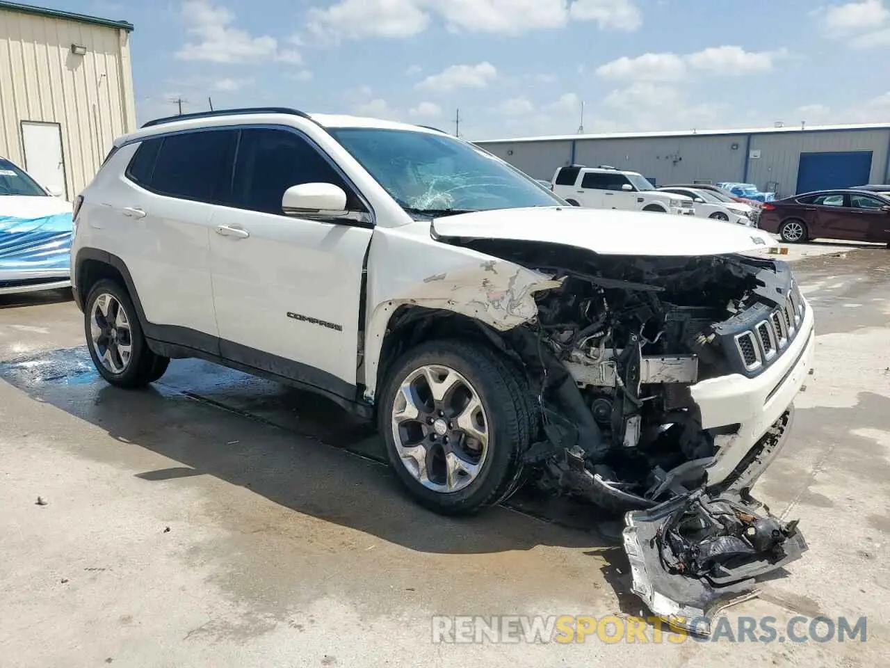 4 Photograph of a damaged car 3C4NJDCB9KT618950 JEEP COMPASS 2019