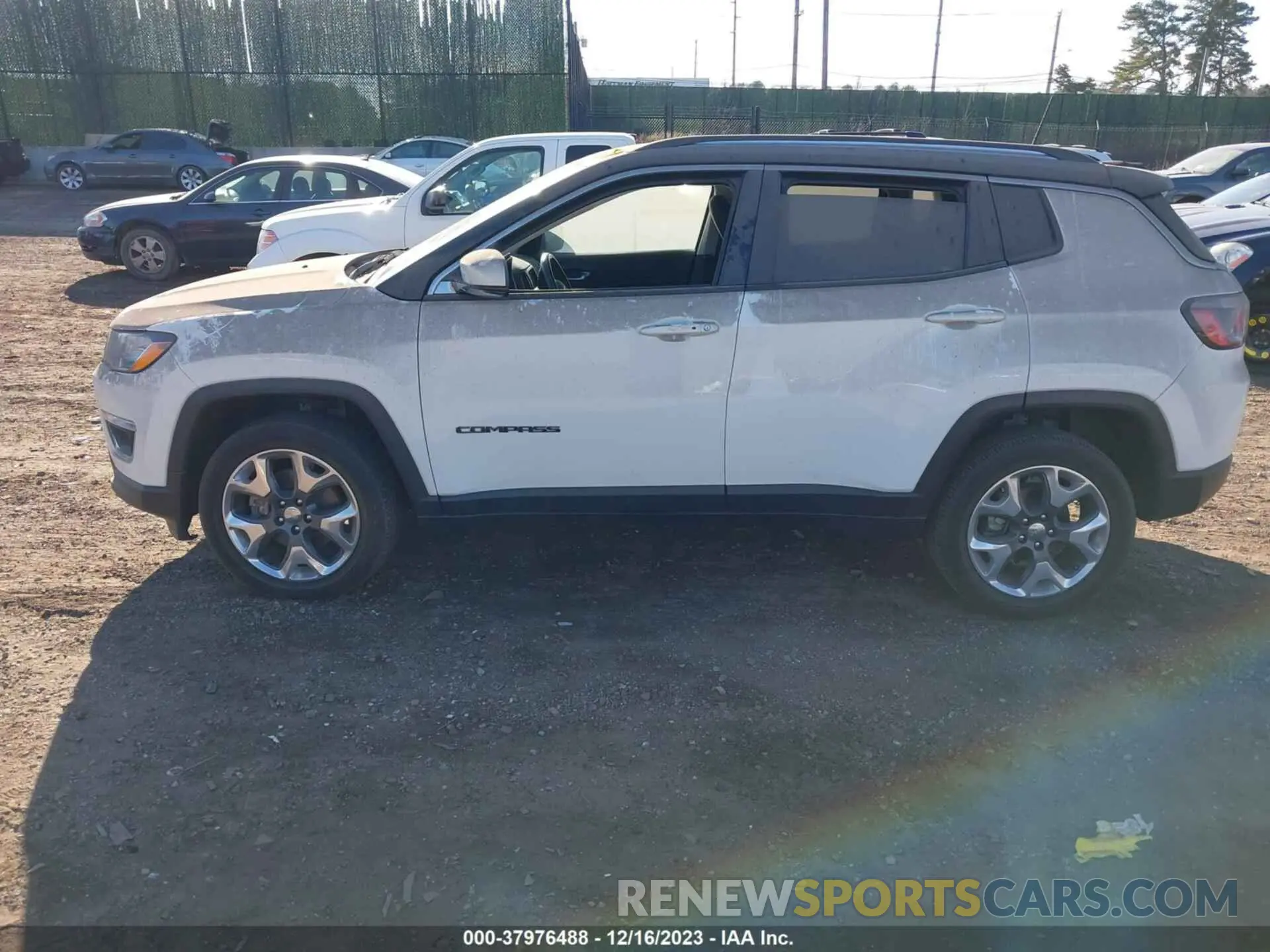 14 Photograph of a damaged car 3C4NJDCB9KT800583 JEEP COMPASS 2019