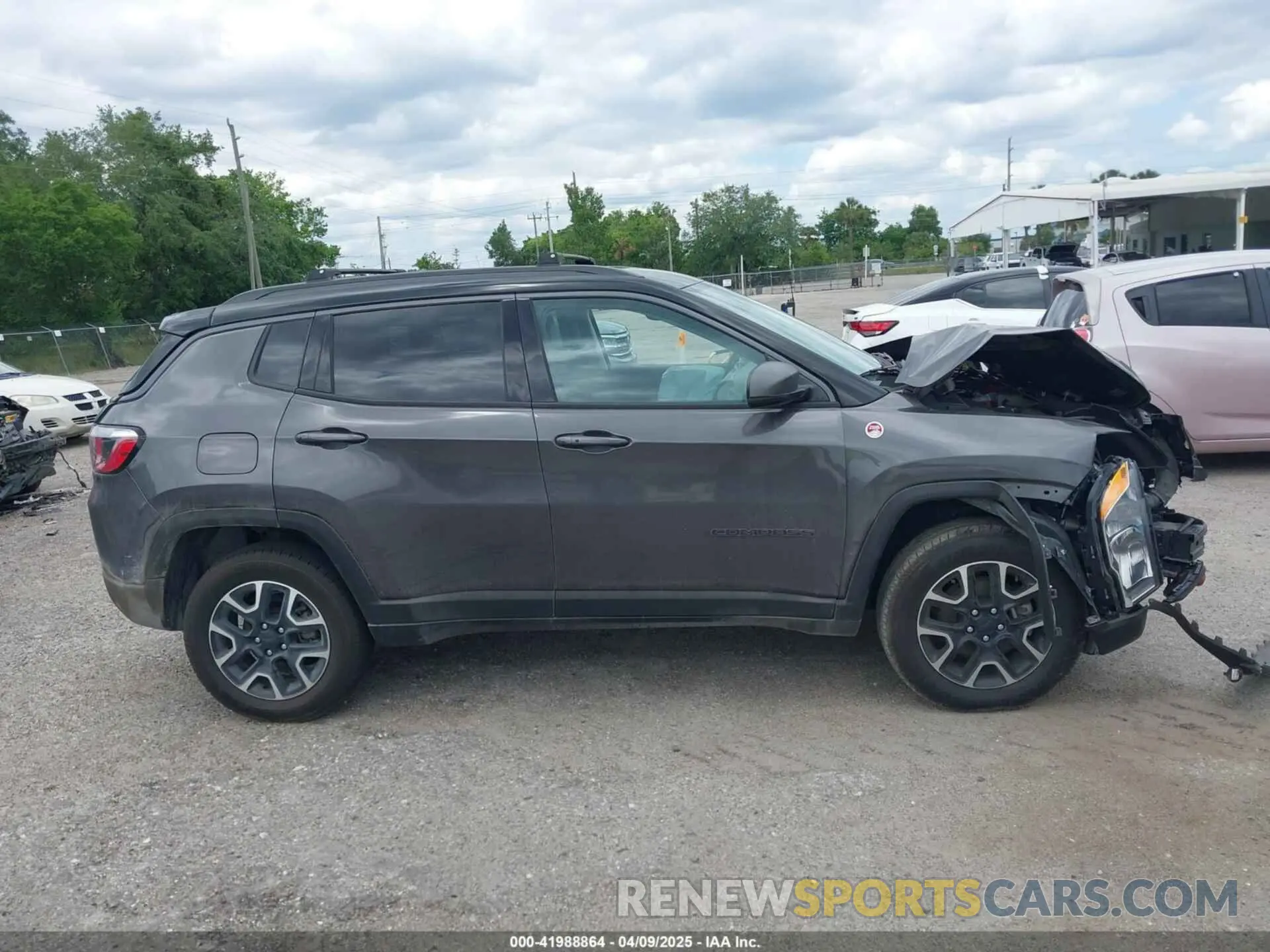 12 Photograph of a damaged car 3C4NJDDB0KT799869 JEEP COMPASS 2019