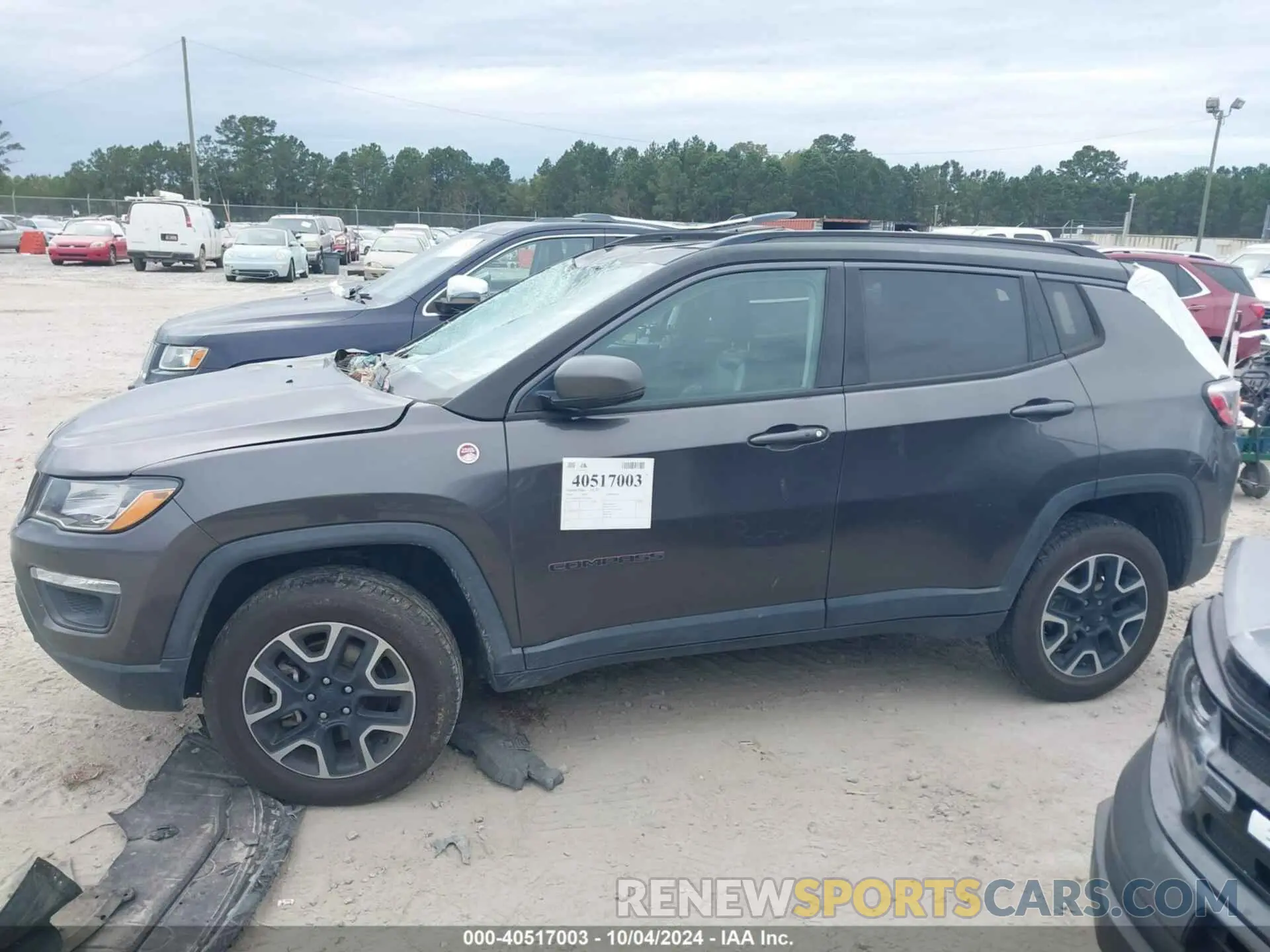 14 Photograph of a damaged car 3C4NJDDB1KT740099 JEEP COMPASS 2019
