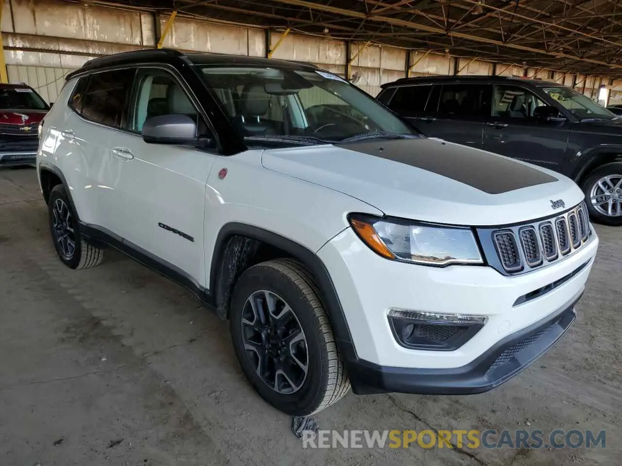 4 Photograph of a damaged car 3C4NJDDB2KT618268 JEEP COMPASS 2019