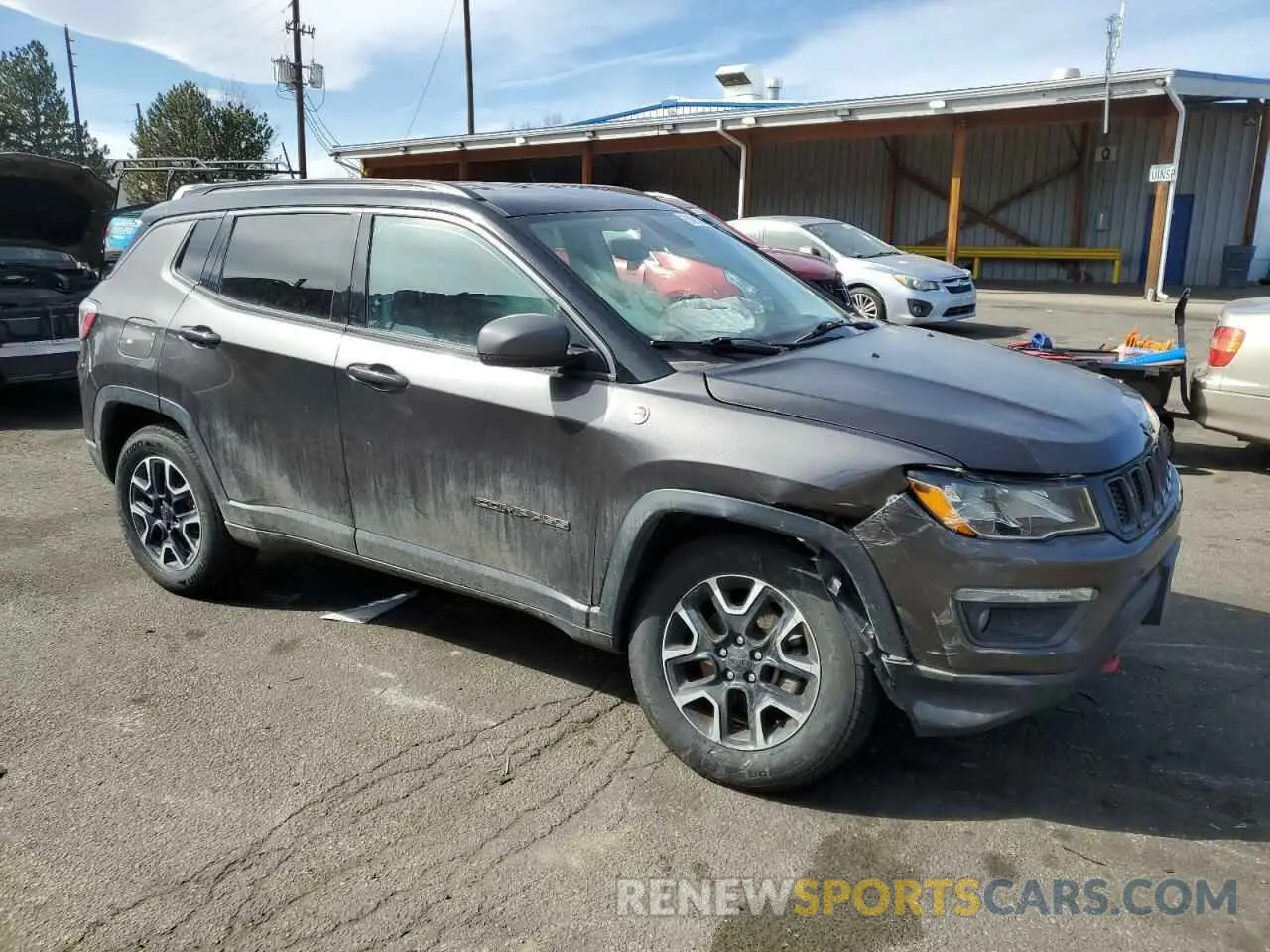 4 Photograph of a damaged car 3C4NJDDB2KT799842 JEEP COMPASS 2019