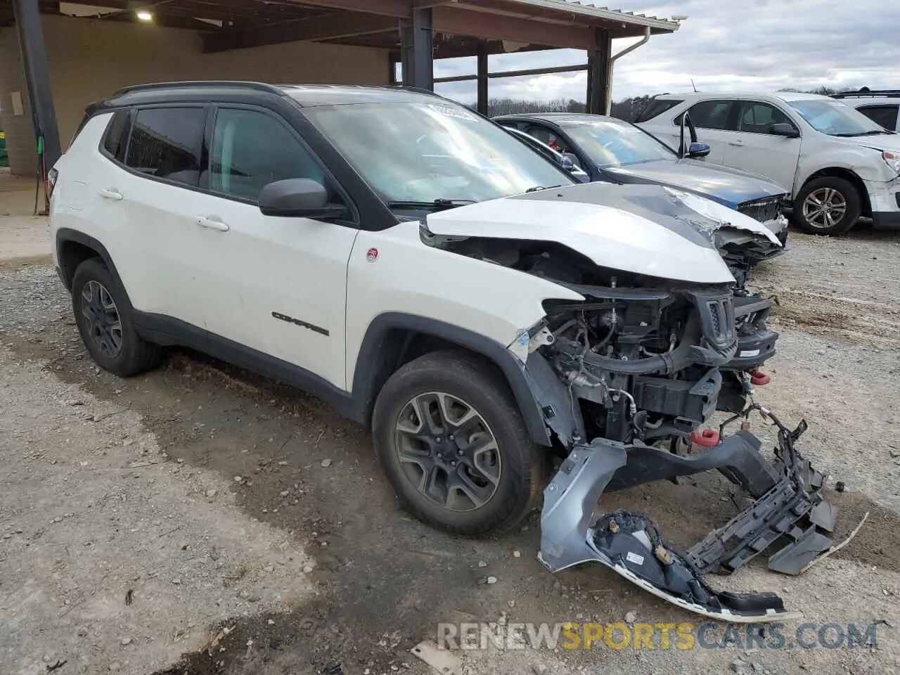 4 Photograph of a damaged car 3C4NJDDB4KT740047 JEEP COMPASS 2019