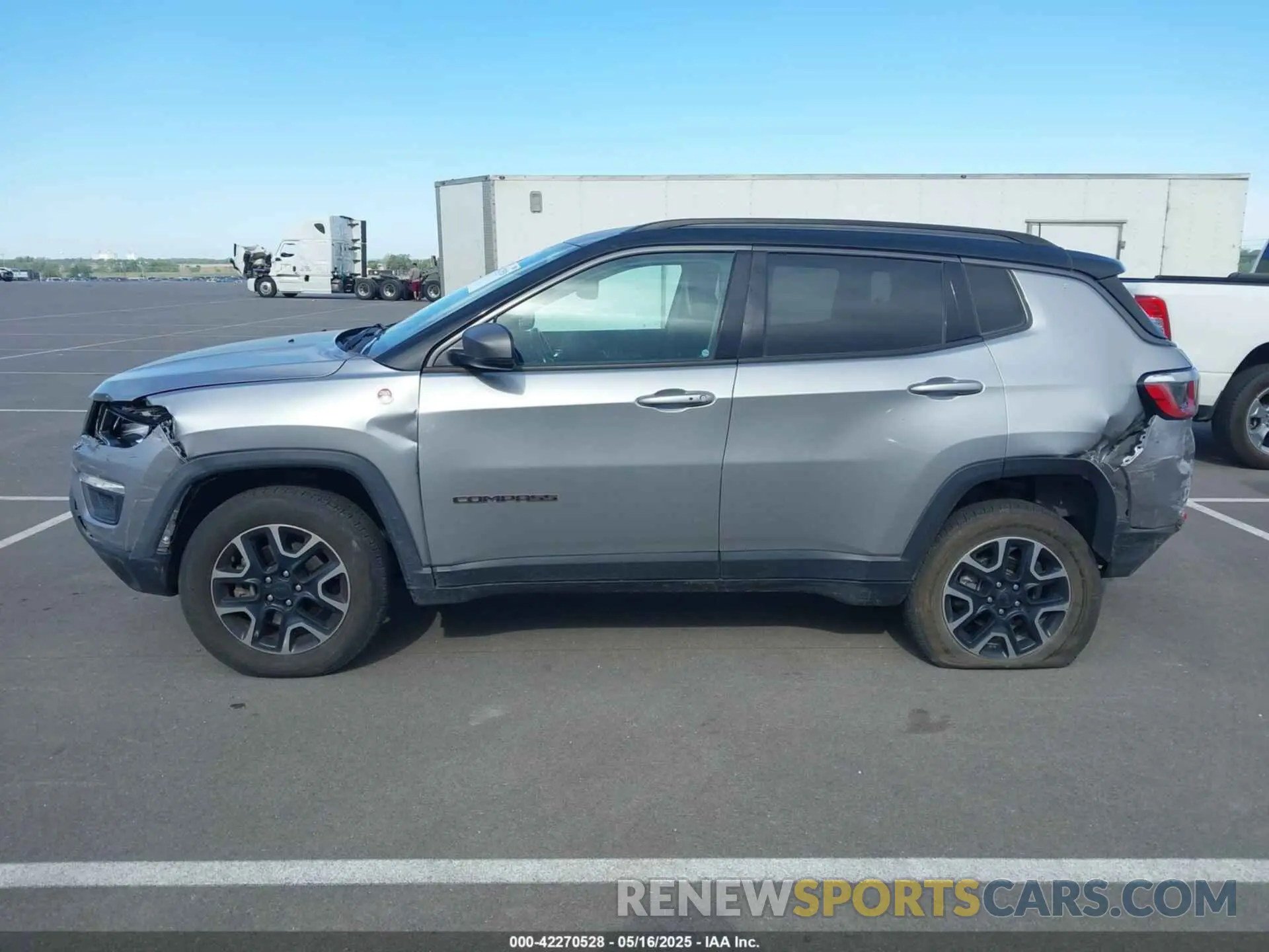14 Photograph of a damaged car 3C4NJDDB6KT722424 JEEP COMPASS 2019