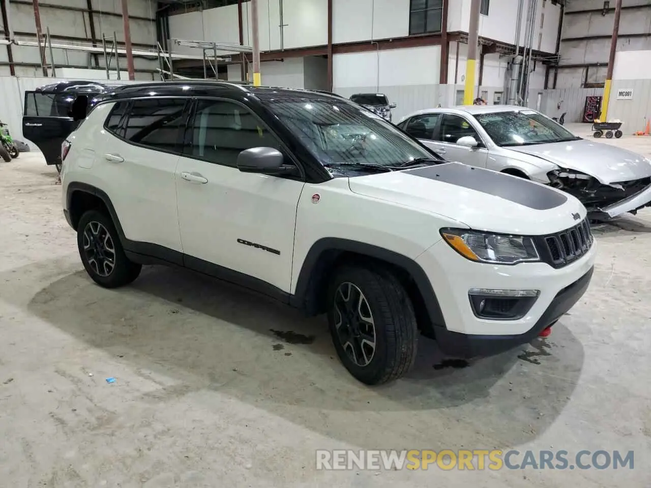 4 Photograph of a damaged car 3C4NJDDB8KT733313 JEEP COMPASS 2019
