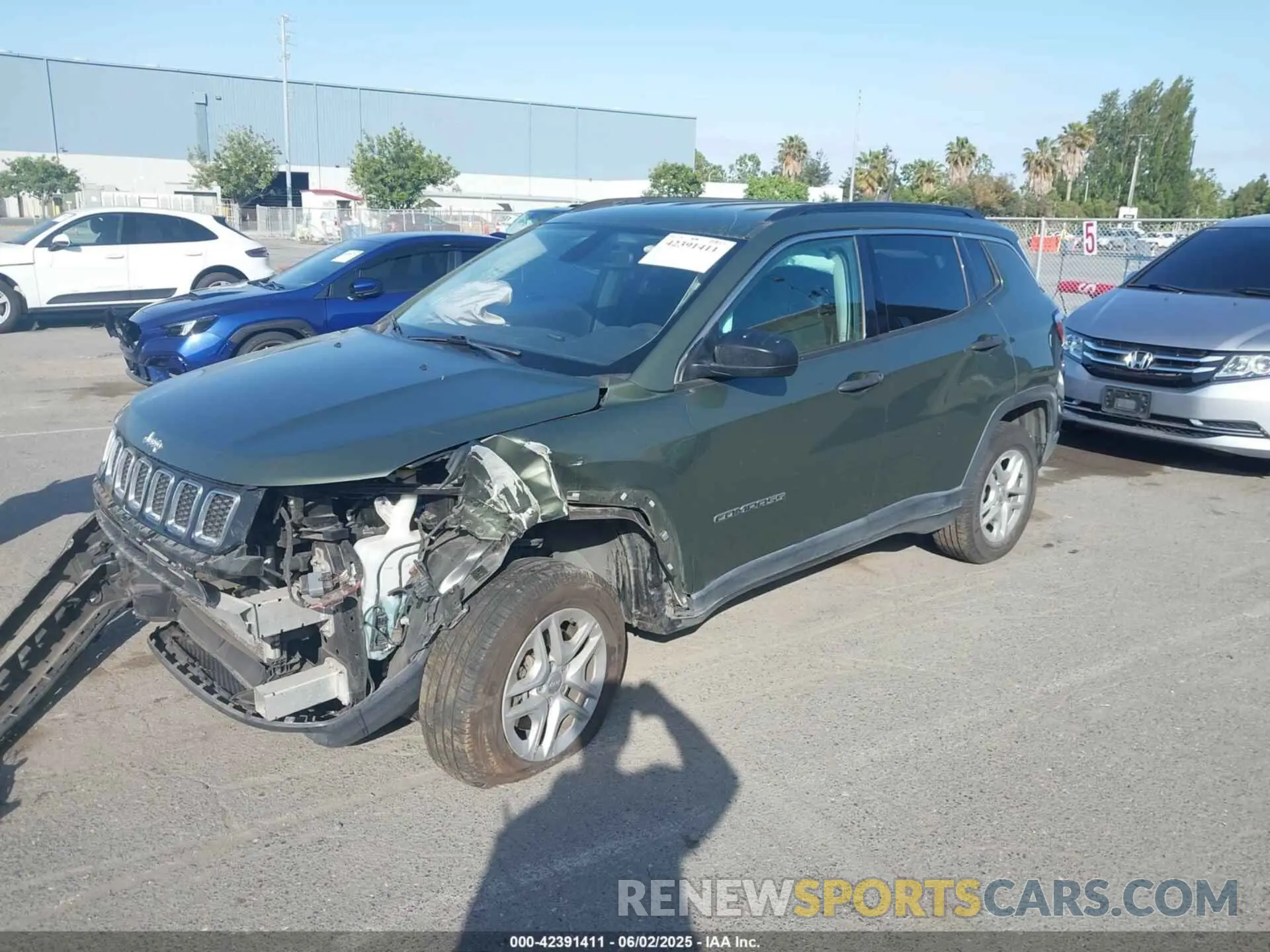 2 Photograph of a damaged car 3C4NJDAB4MT543838 JEEP COMPASS 2021