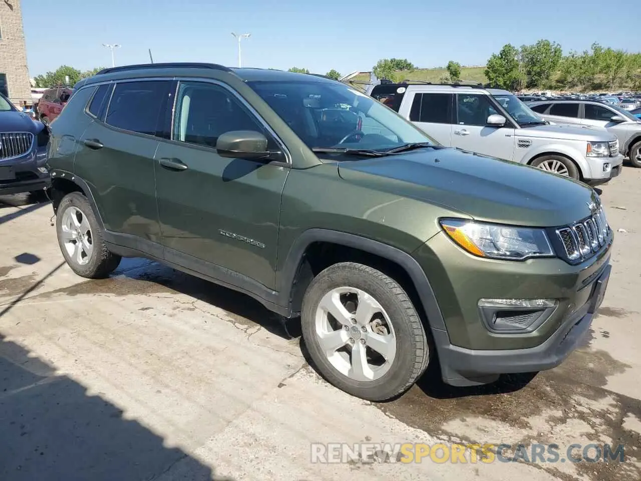 4 Photograph of a damaged car 3C4NJDBBXMT558309 JEEP COMPASS 2021