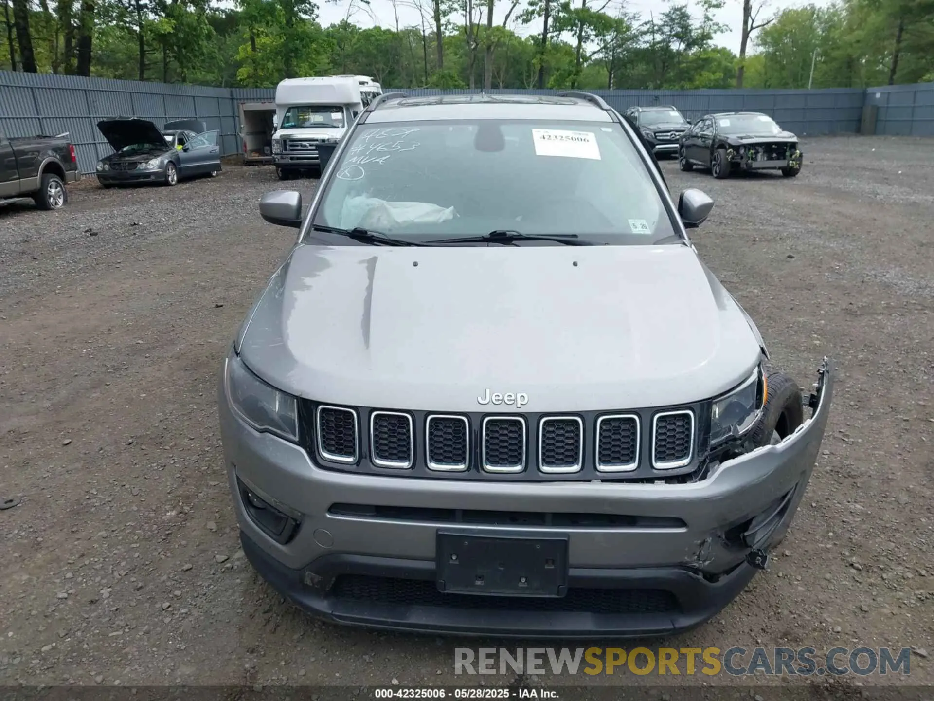 11 Photograph of a damaged car 3C4NJDBBXMT569861 JEEP COMPASS 2021