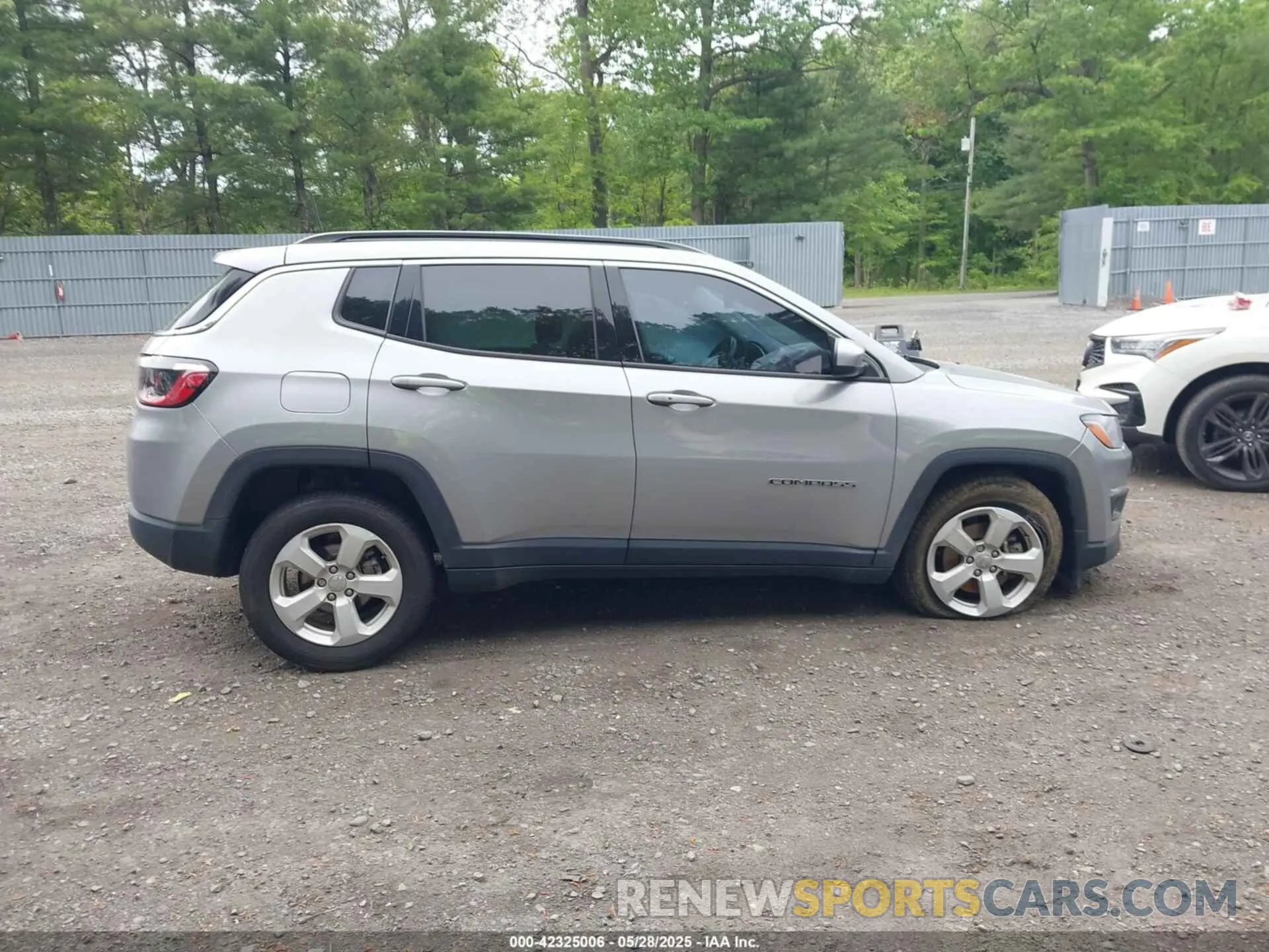 12 Photograph of a damaged car 3C4NJDBBXMT569861 JEEP COMPASS 2021