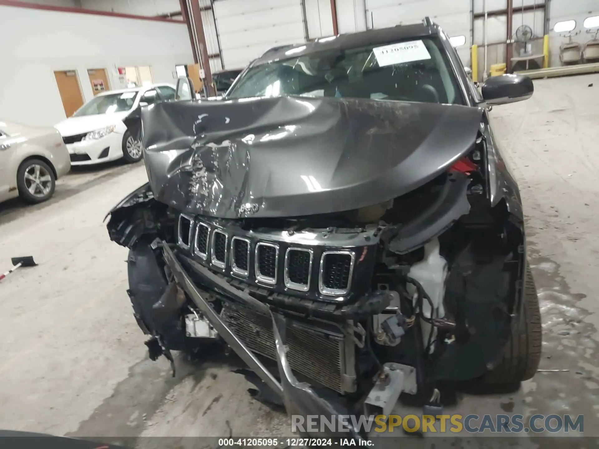 11 Photograph of a damaged car 3C4NJDCB3MT572437 JEEP COMPASS 2021