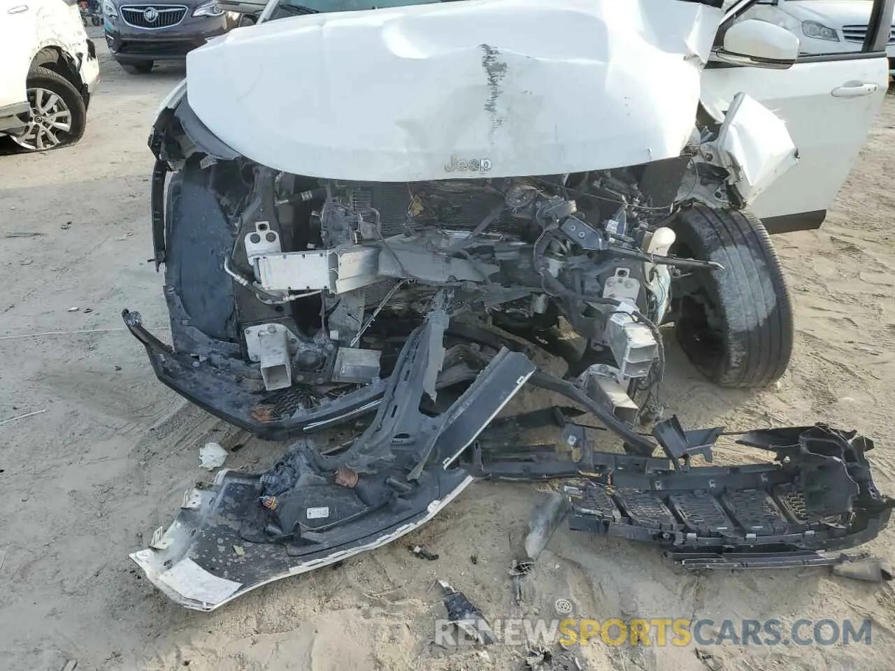12 Photograph of a damaged car 3C4NJDCB6MT528562 JEEP COMPASS 2021