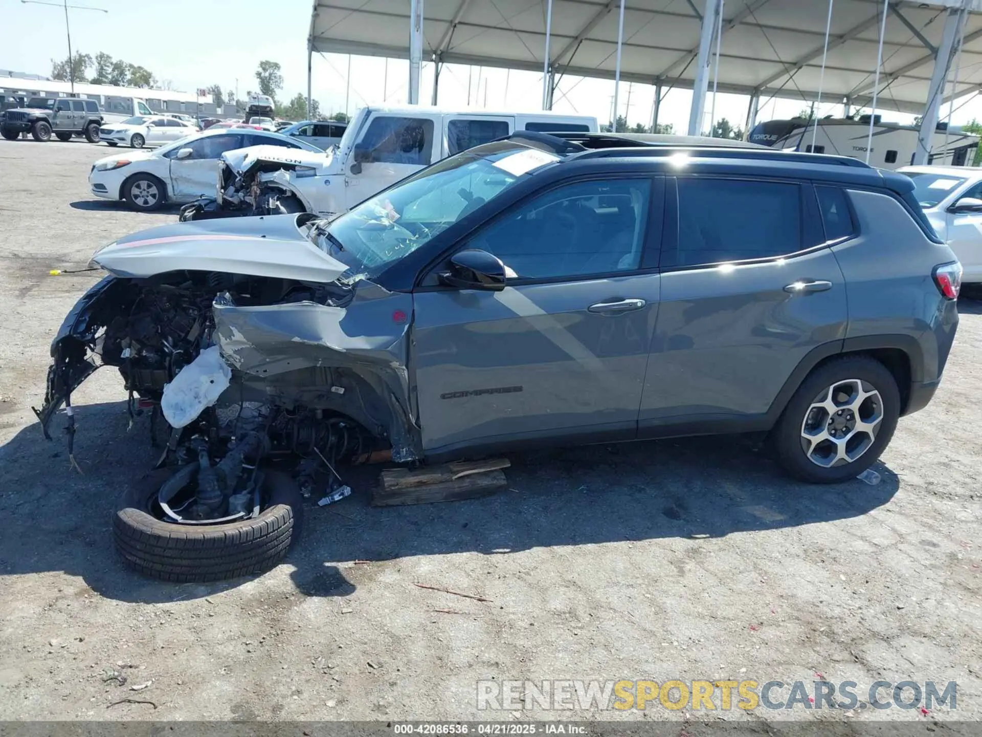 14 Photograph of a damaged car 3C4NJDDB2NT224046 JEEP COMPASS 2022