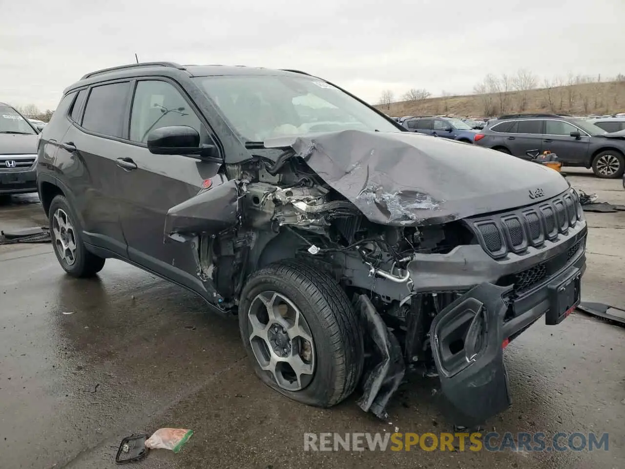 4 Photograph of a damaged car 3C4NJDDB4NT199957 JEEP COMPASS 2022