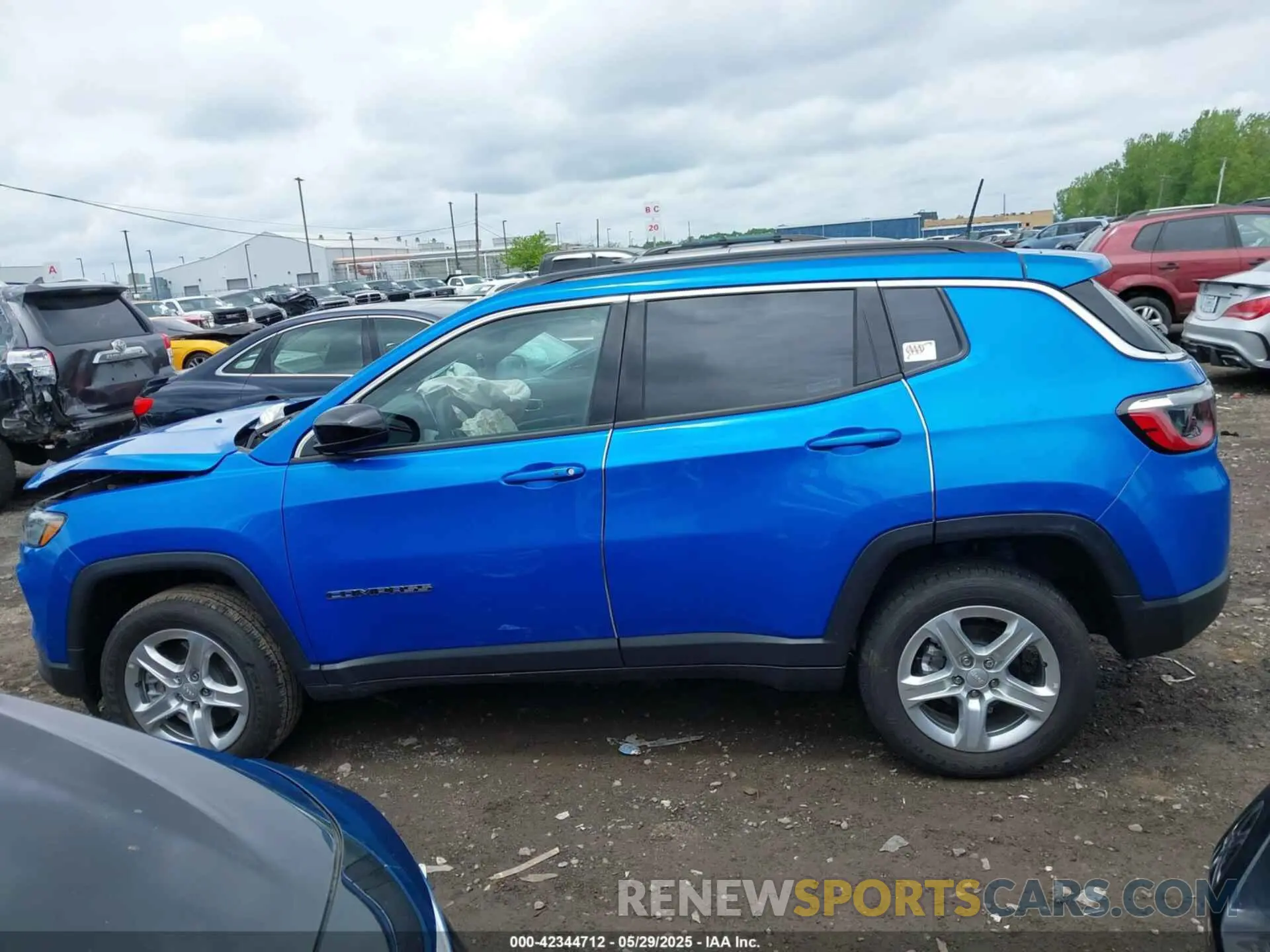 14 Photograph of a damaged car 3C4NJDBN6PT513561 JEEP COMPASS 2023