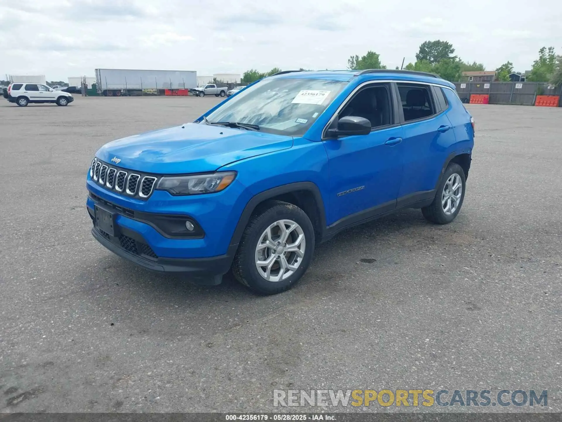 2 Photograph of a damaged car 3C4NJDBN1RT111868 JEEP COMPASS 2024