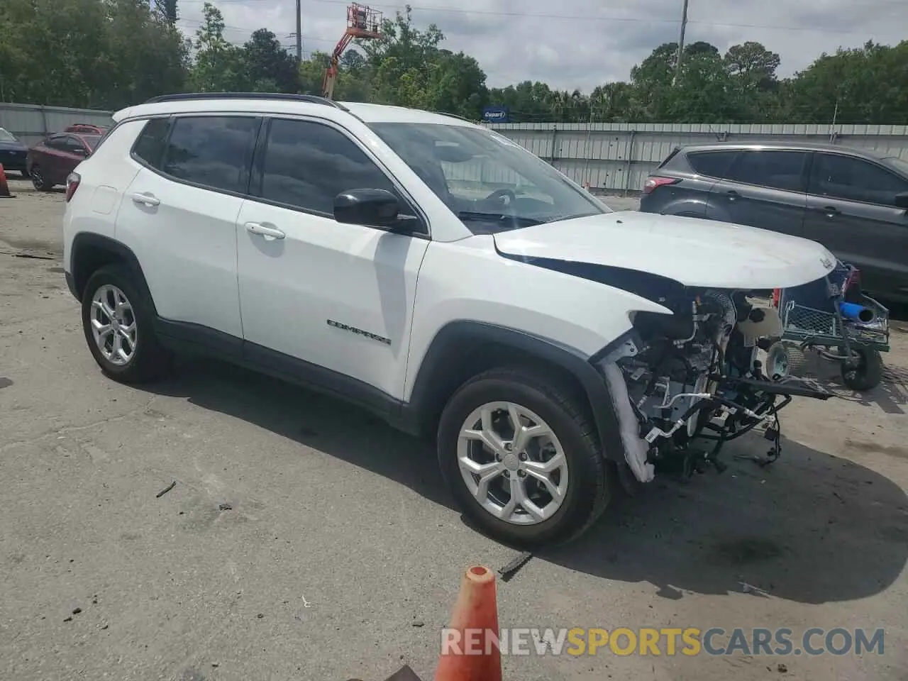 4 Photograph of a damaged car 3C4NJDBN2RT136469 JEEP COMPASS 2024